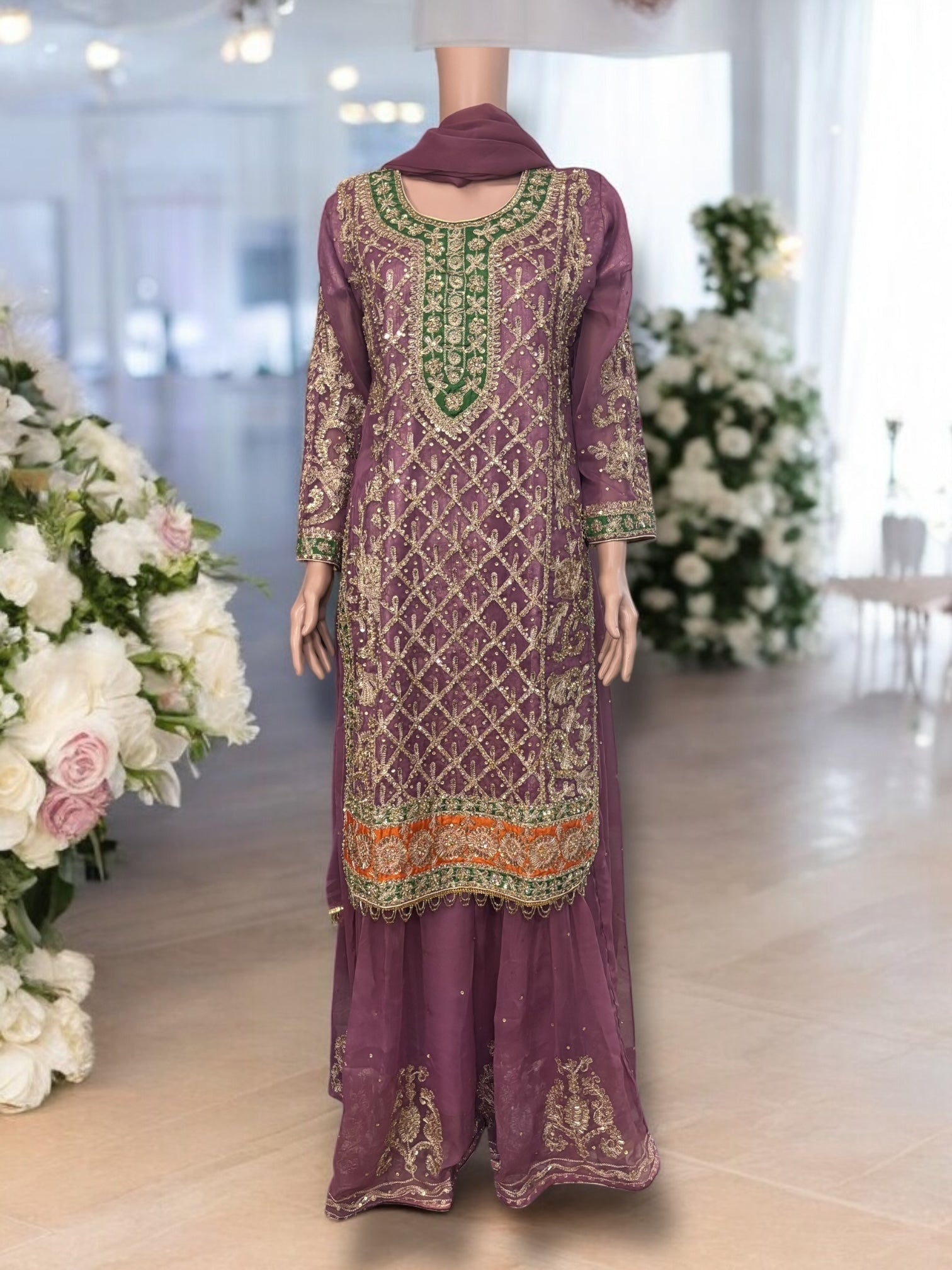 Traditional designer Sharara Salwar Kameez set by Saree Ghor Charlotte, ethnic wear for women with intricate embroidery and vibrant fabric.
