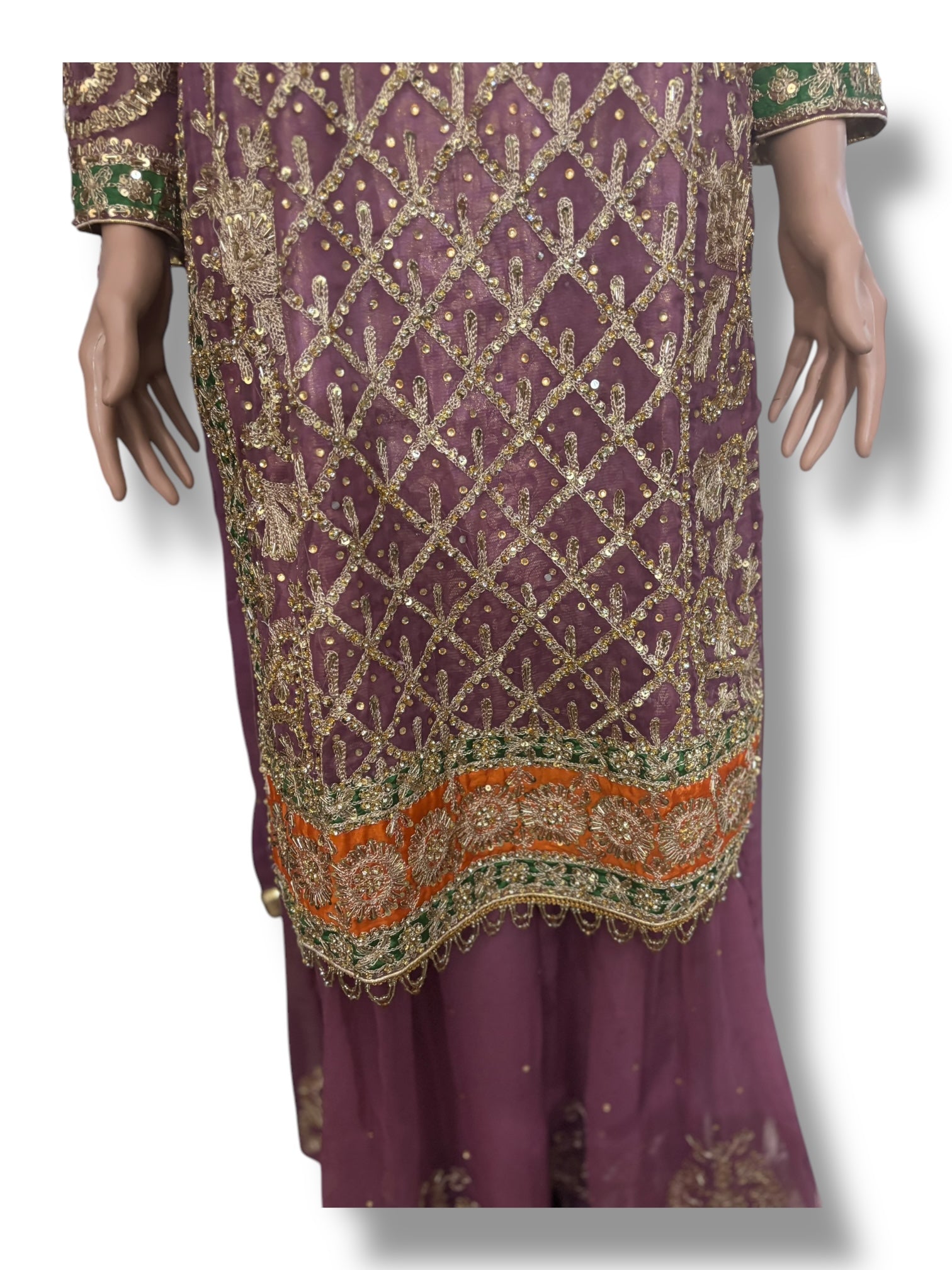 Traditional designer Sharara Salwar Kameez set by Saree Ghor Charlotte, ethnic wear for women with intricate embroidery and vibrant fabric.