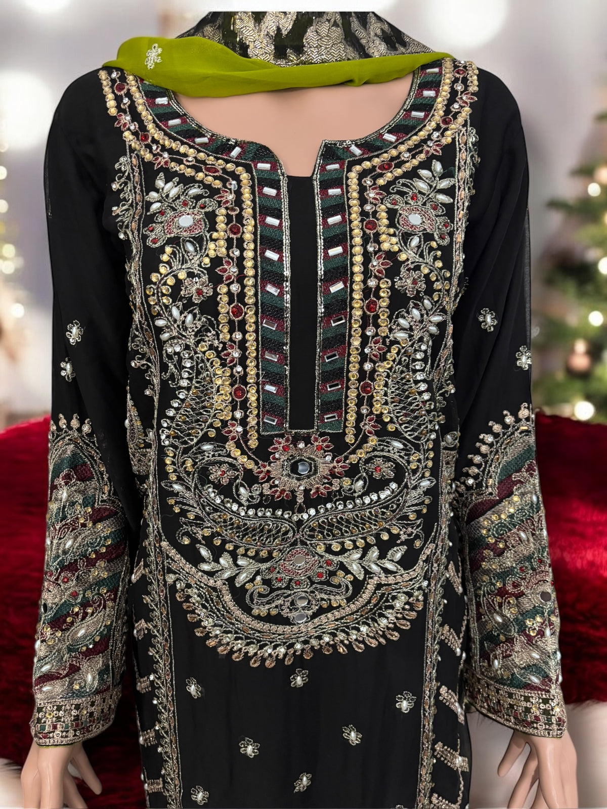 Traditional designer Sharara Salwar Kameez set by Saree Ghor Charlotte, featuring intricate ethnic embroidery for women.