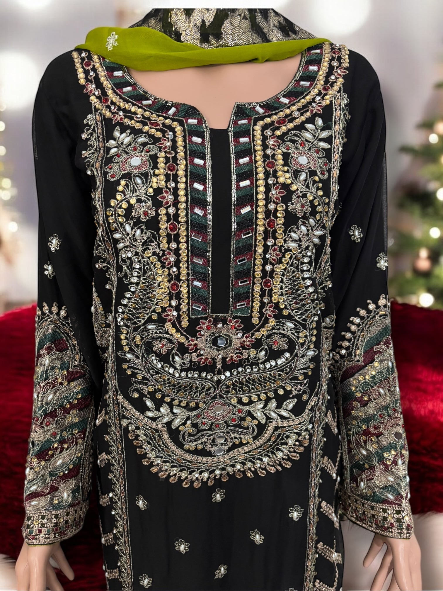 Traditional designer Sharara Salwar Kameez set by Saree Ghor Charlotte, elegant ethnic wear for women with intricate details.
