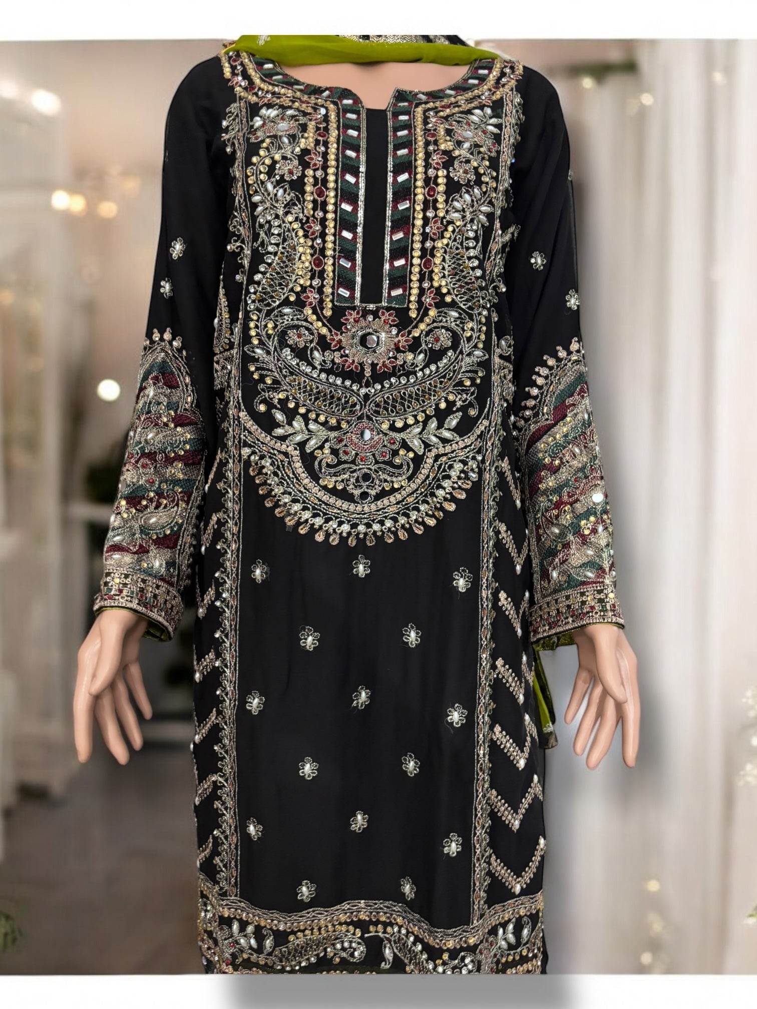 Traditional designer Sharara Salwar Kameez set by Saree Ghor Charlotte, ethnic women's cultural wear with intricate detailing.