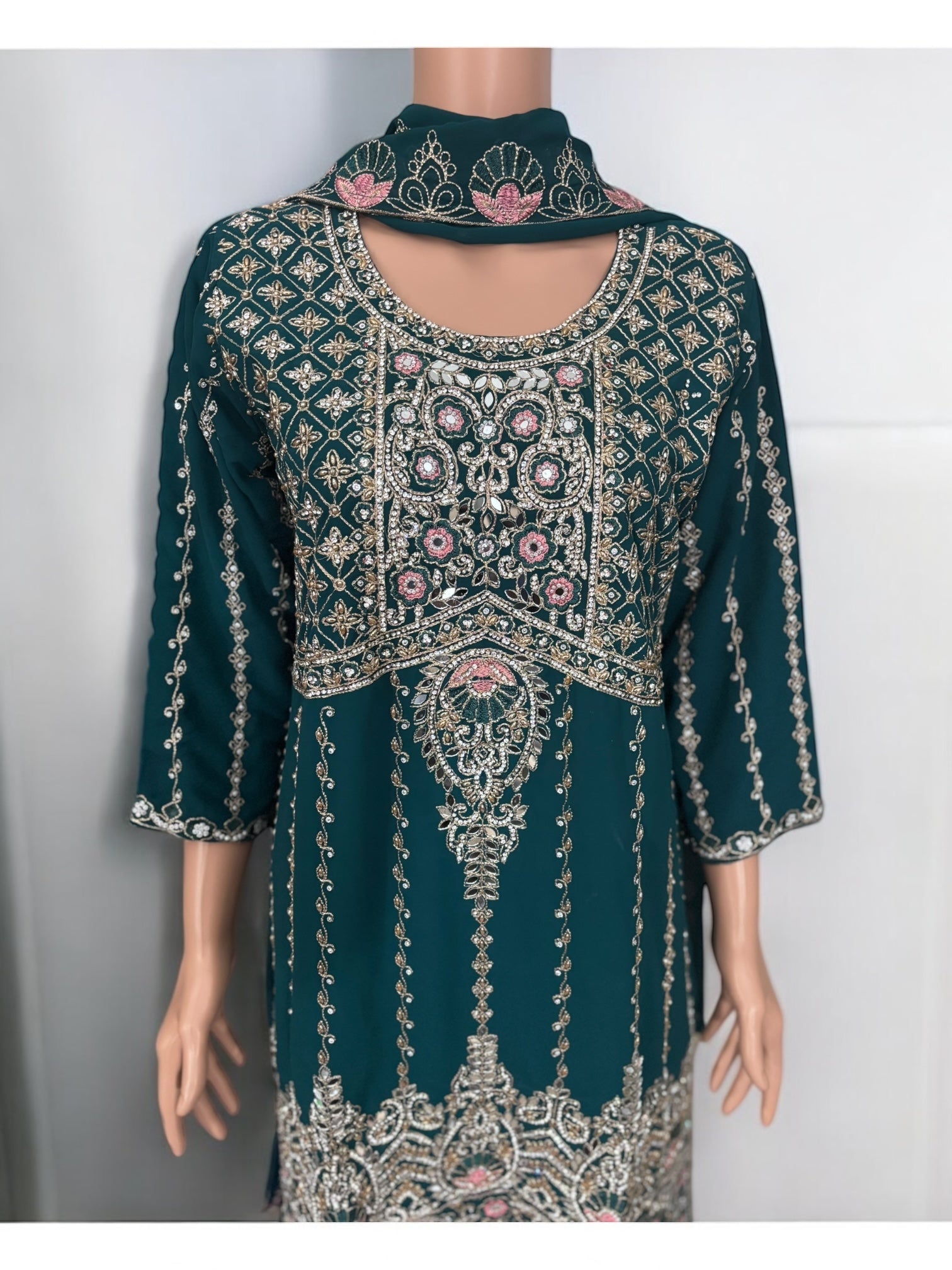 Traditional Saree Ghor Charlotte Sharara Salwar Kameez suit with intricate ethnic embroidery and vibrant colors.