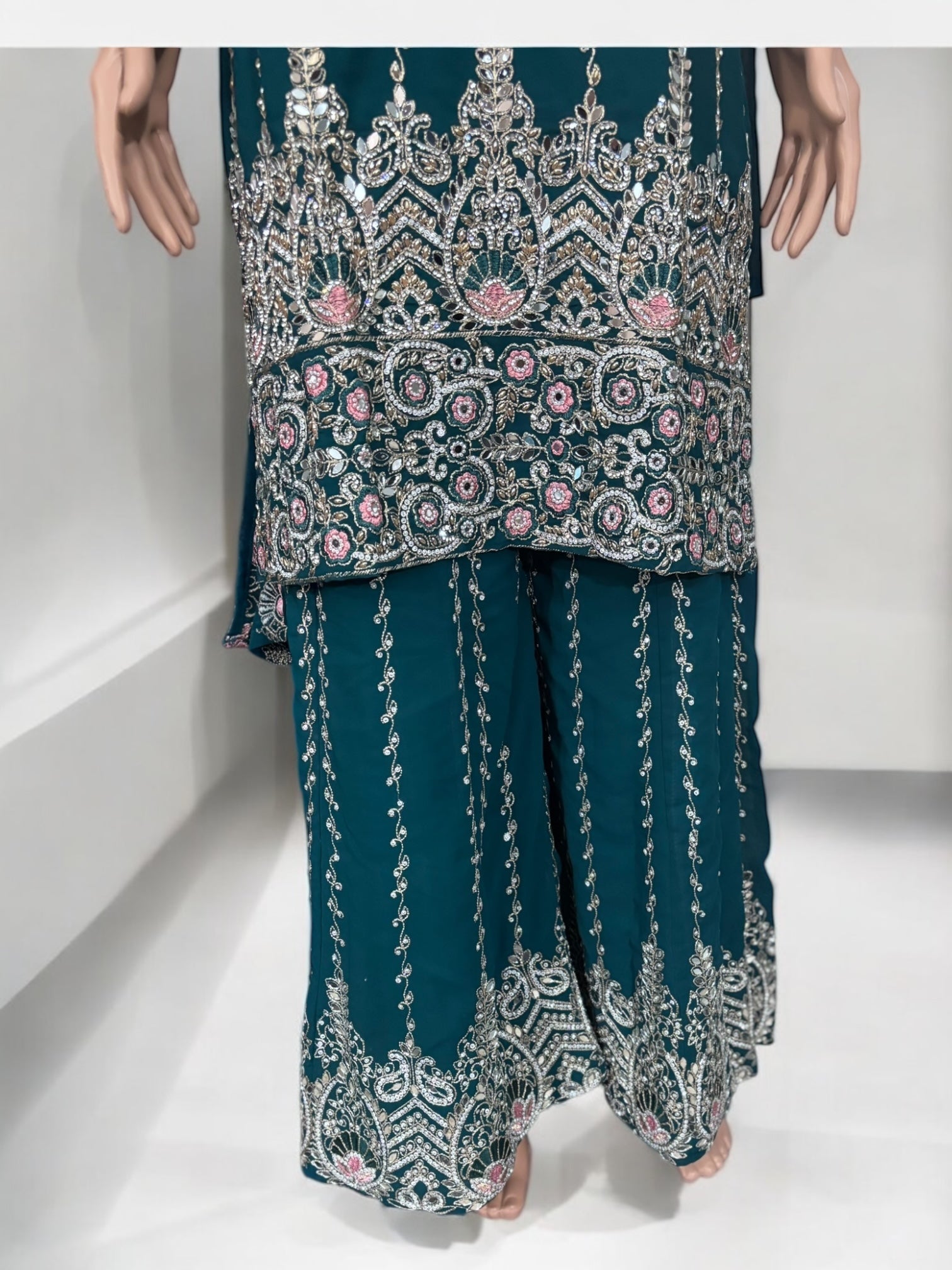 Traditional Saree Ghor Charlotte Salwar Kameez suit with intricate embroidery, ethnic wear for cultural occasions.