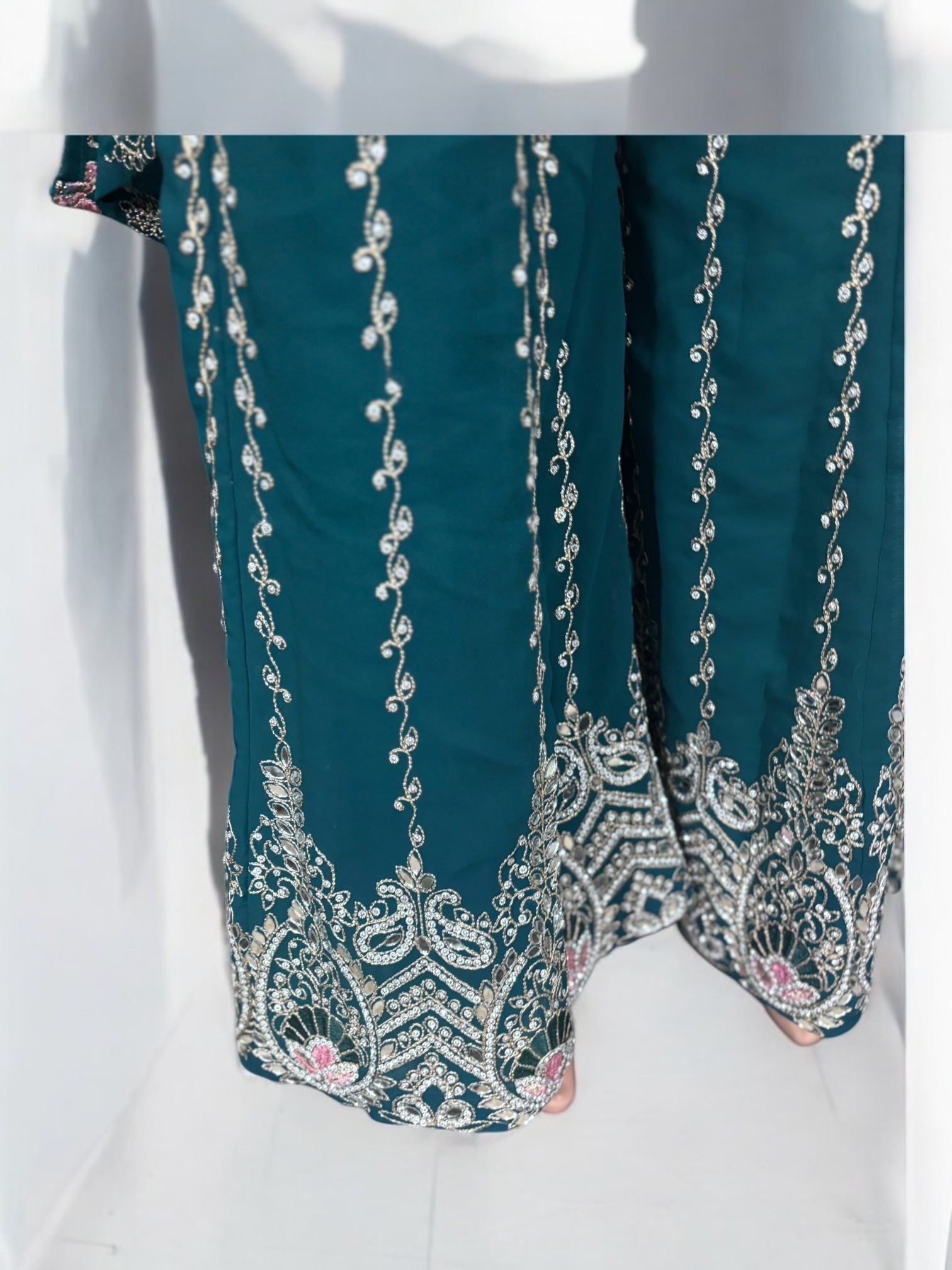 Traditional Saree Ghor Charlotte Salwar Kameez Suit with intricate embroidery and vibrant ethnic design, cultural wear for women.