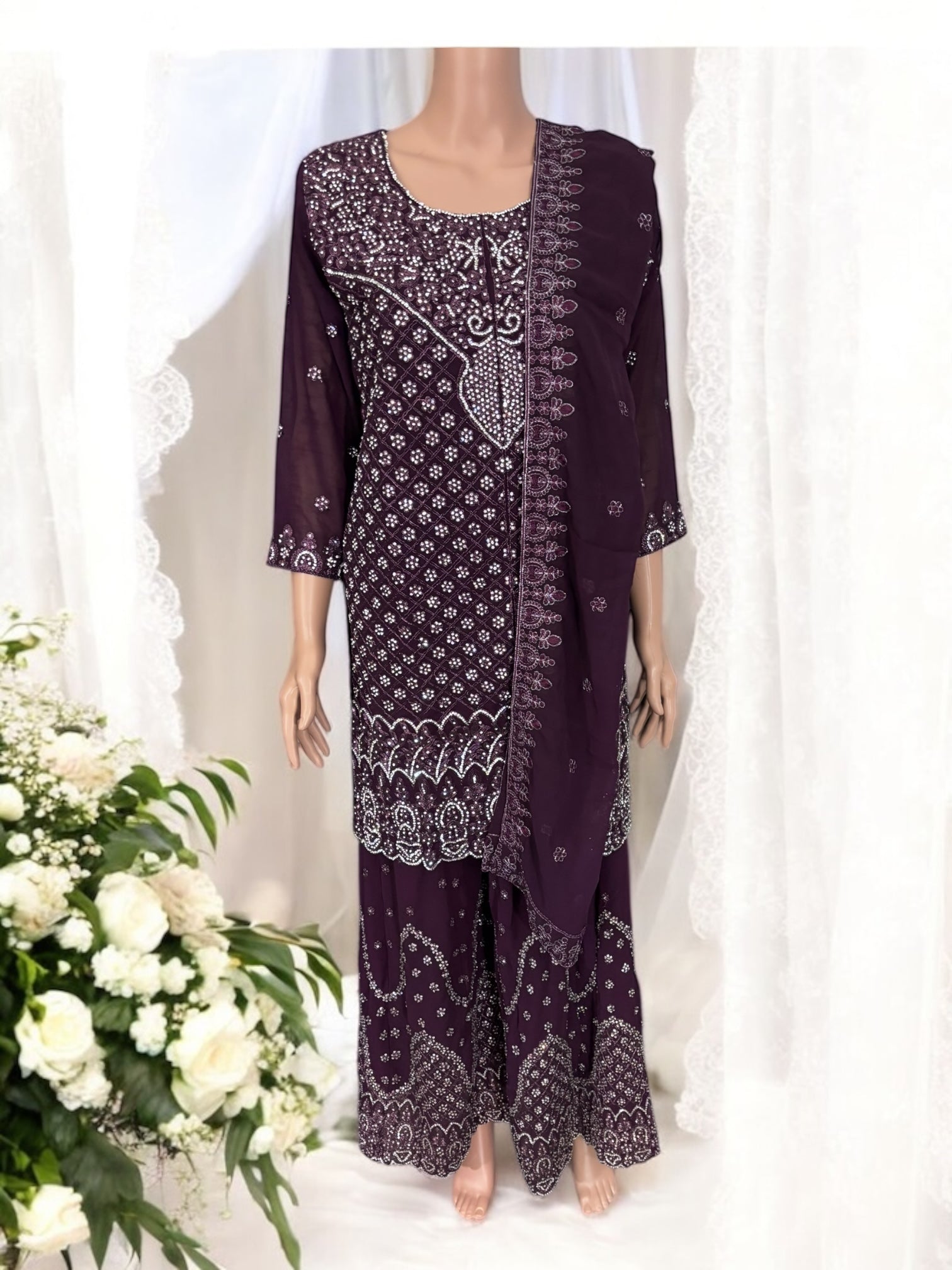 Traditional designer Sharara Salwar Kameez suit by Saree Ghor Charlotte, featuring ethnic wear with intricate details and vibrant colors.