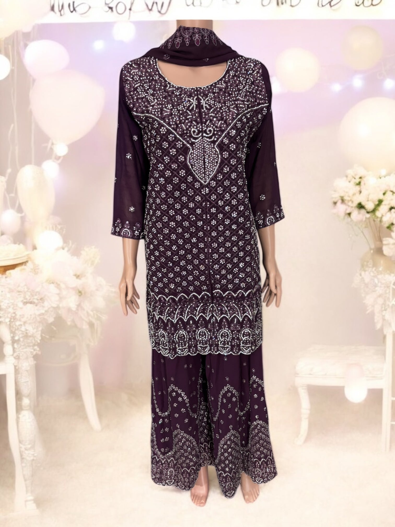 Traditional Saree Ghor Charlotte Salwar Kameez suit with intricate design, showcasing ethnic wear in vibrant colors.