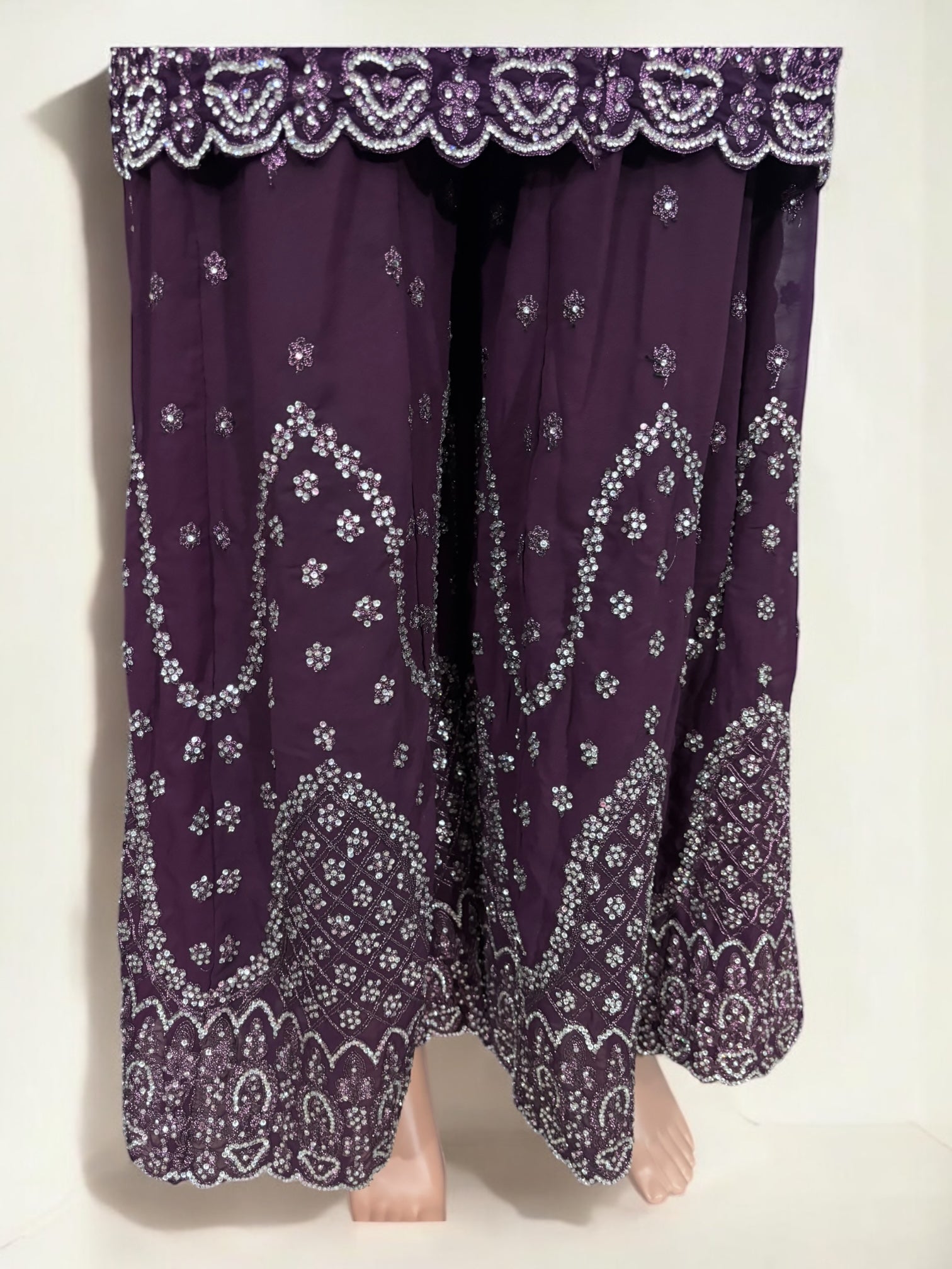 Traditional designer Sharara Salwar Kameez by Saree Ghor Charlotte, featuring intricate ethnic embroidery and vibrant fabric.