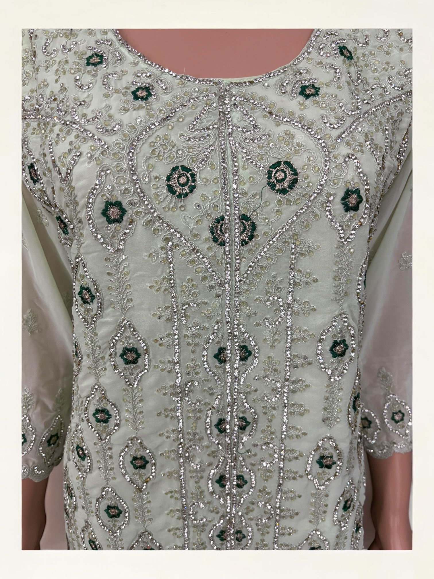 Traditional designer Sharara Salwar Kameez suit by Saree Ghor Charlotte, featuring intricate ethnic embroidery and vibrant fabric for women.