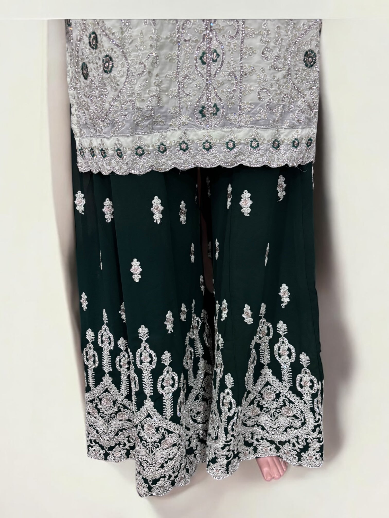 Traditional designer Sharara Salwar Kameez suit by Saree Ghor Charlotte, featuring intricate ethnic embroidery and vibrant fabric.