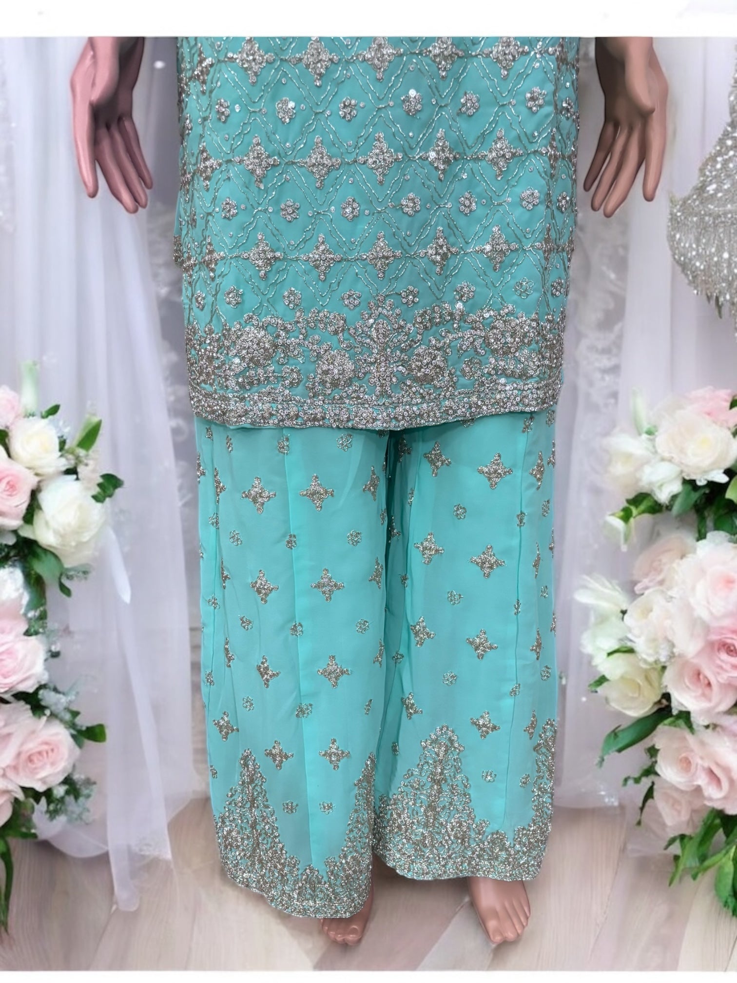 Traditional designer Sharara Salwar Kameez suit by Saree Ghor Charlotte, showcasing intricate embroidery and vibrant ethnic wear for women.