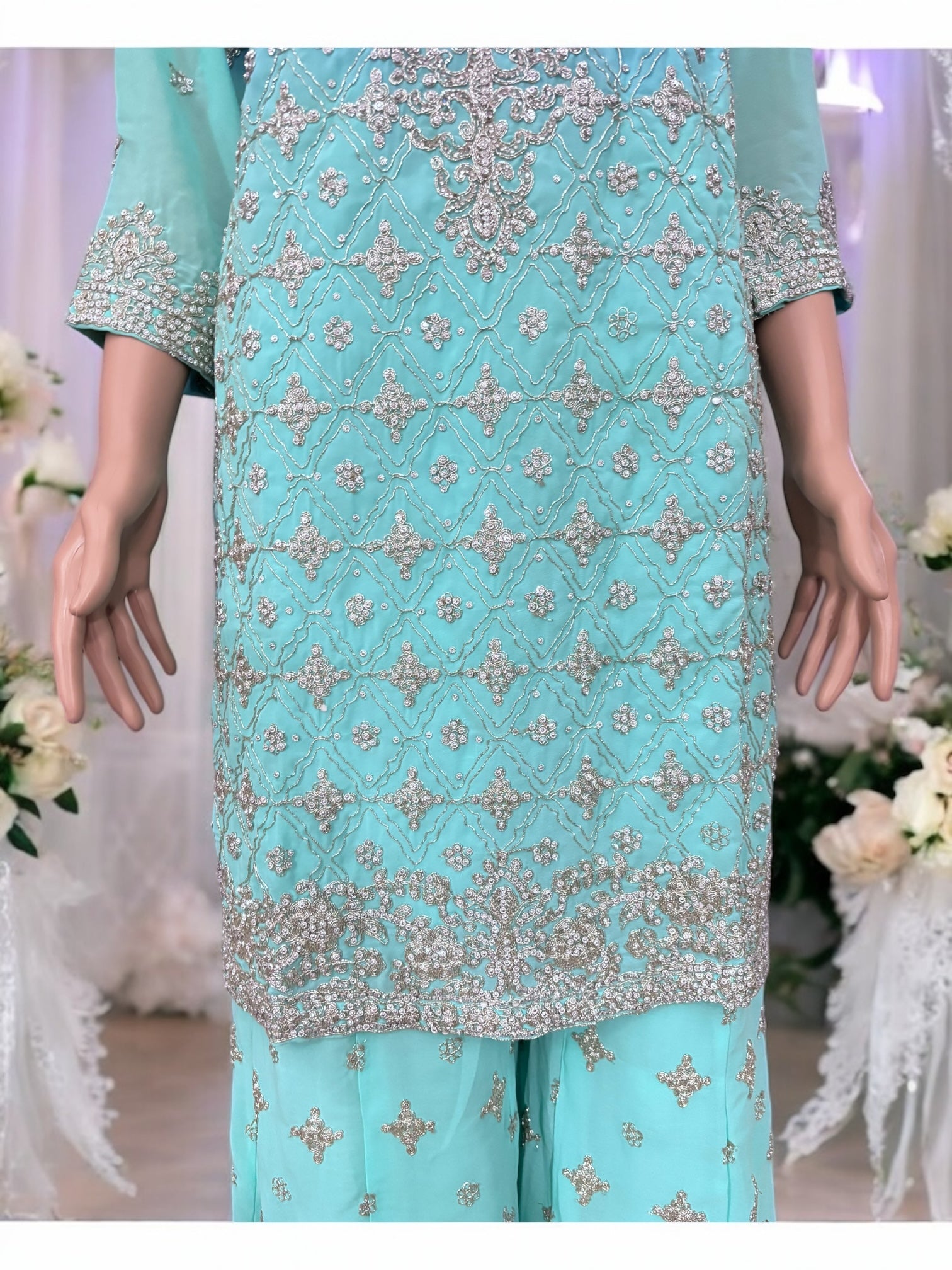 Traditional Saree Ghor Charlotte designer Sharara Salwar Kameez suit for women, featuring intricate ethnic embroidery and vibrant fabric.