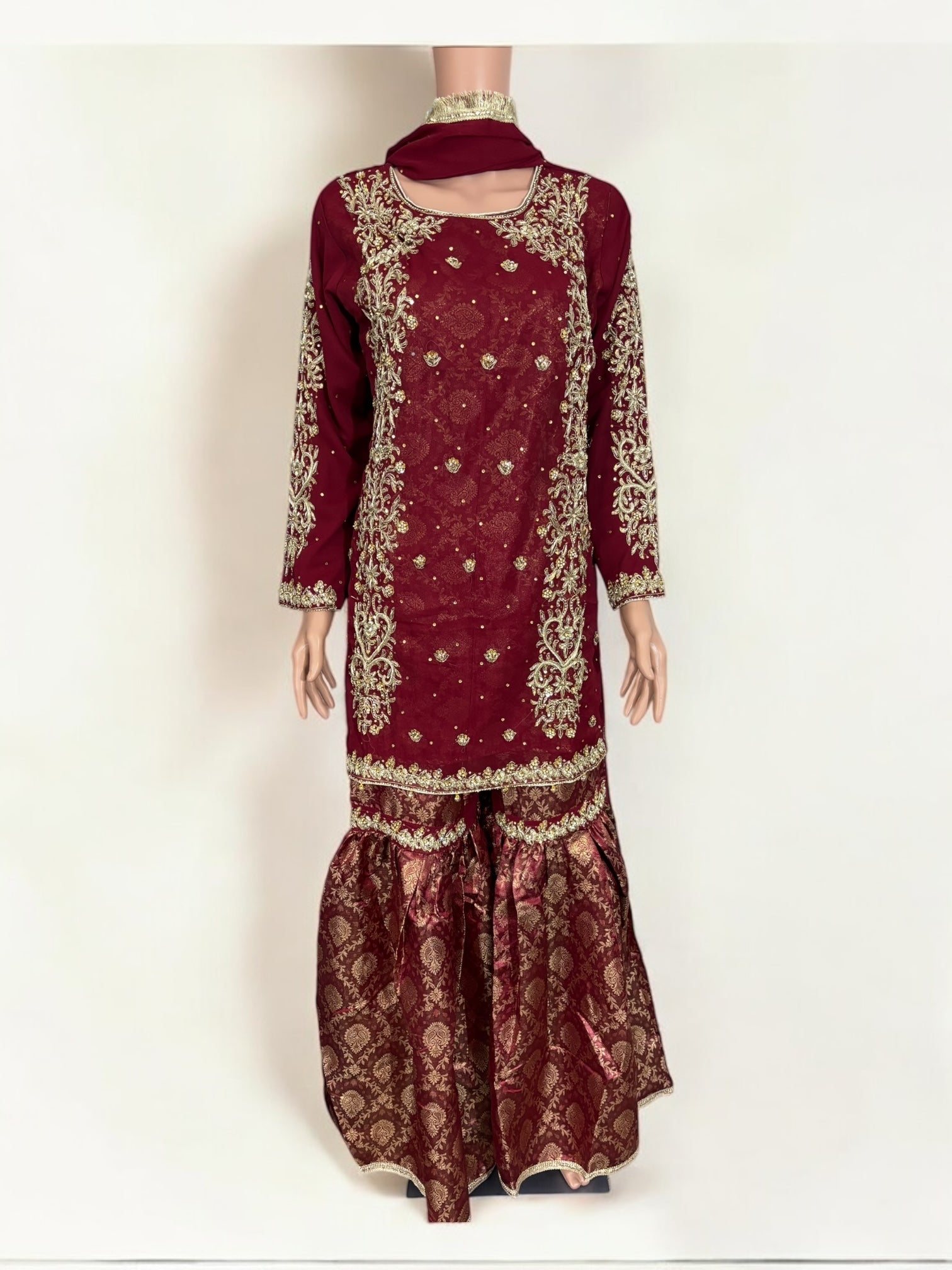 Traditional Garara designer Salwar Kameez suit by Saree Ghor Charlotte, featuring intricate ethnic embroidery and vibrant fabric for women.