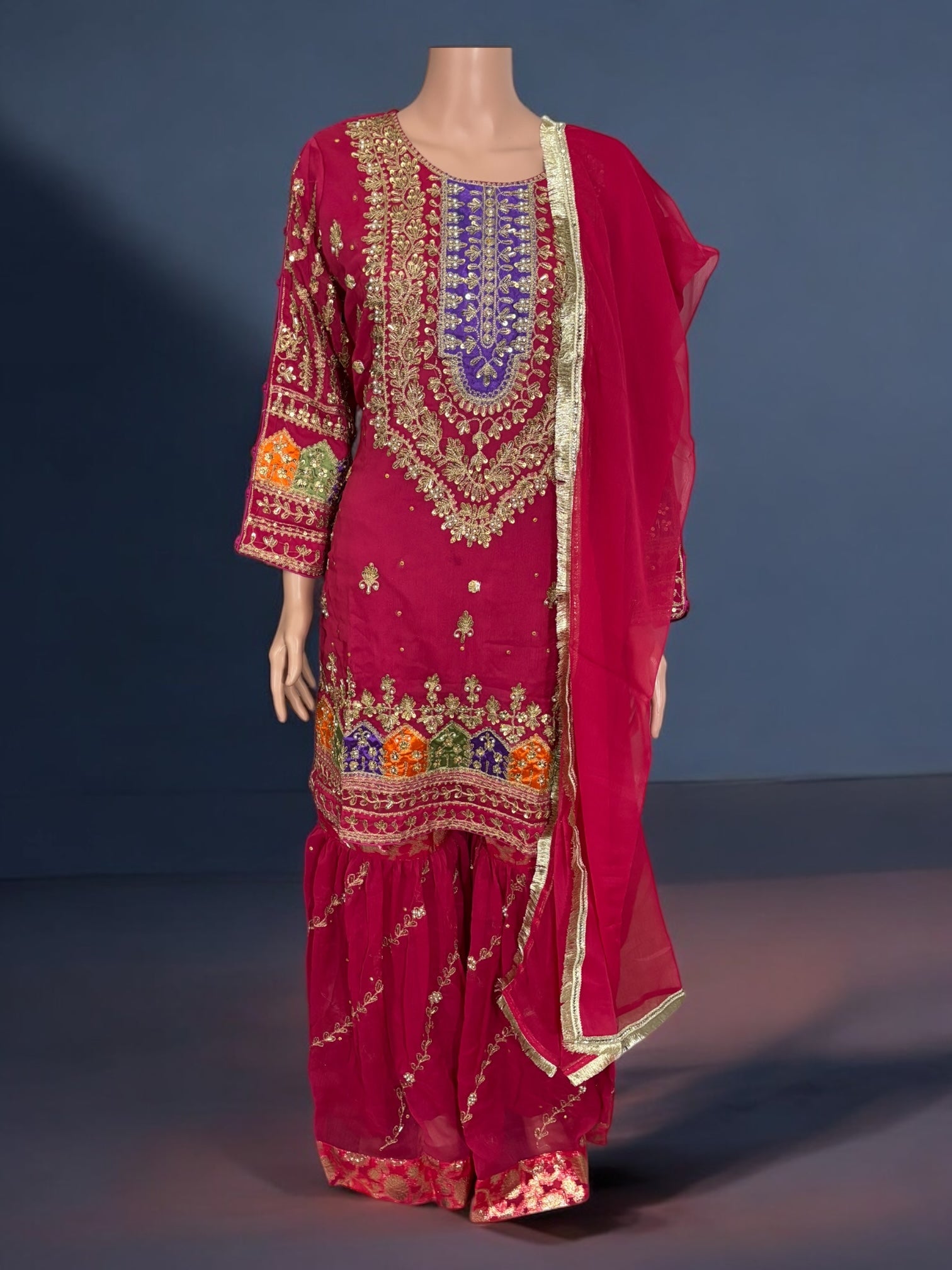 Traditional Garara designer Salwar Kameez suit by Saree Ghor Charlotte, featuring intricate embroidery and vibrant ethnic wear for women.