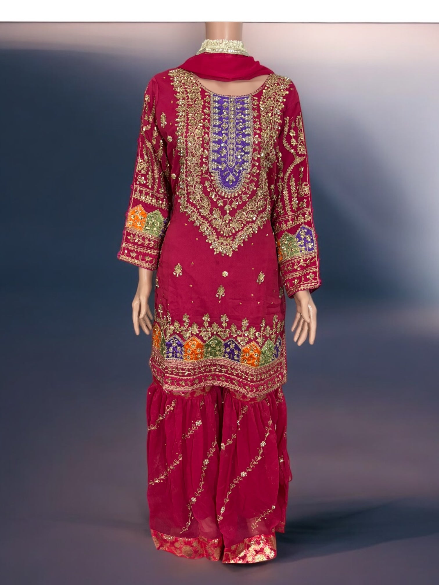 Traditional Garara designer Salwar Kameez suit by Saree Ghor Charlotte, featuring intricate embroidery and vibrant ethnic wear for women.