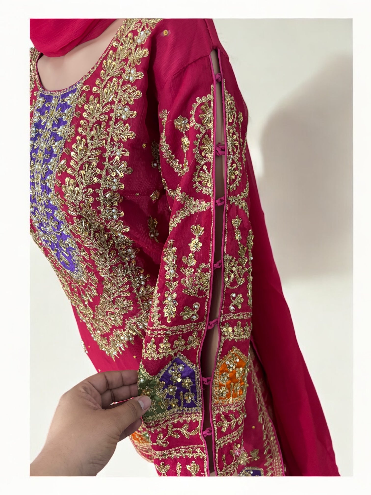 Traditional Garara designer Salwar Kameez suit by Saree Ghor Charlotte, featuring intricate ethnic embroidery and vibrant fabric for women.