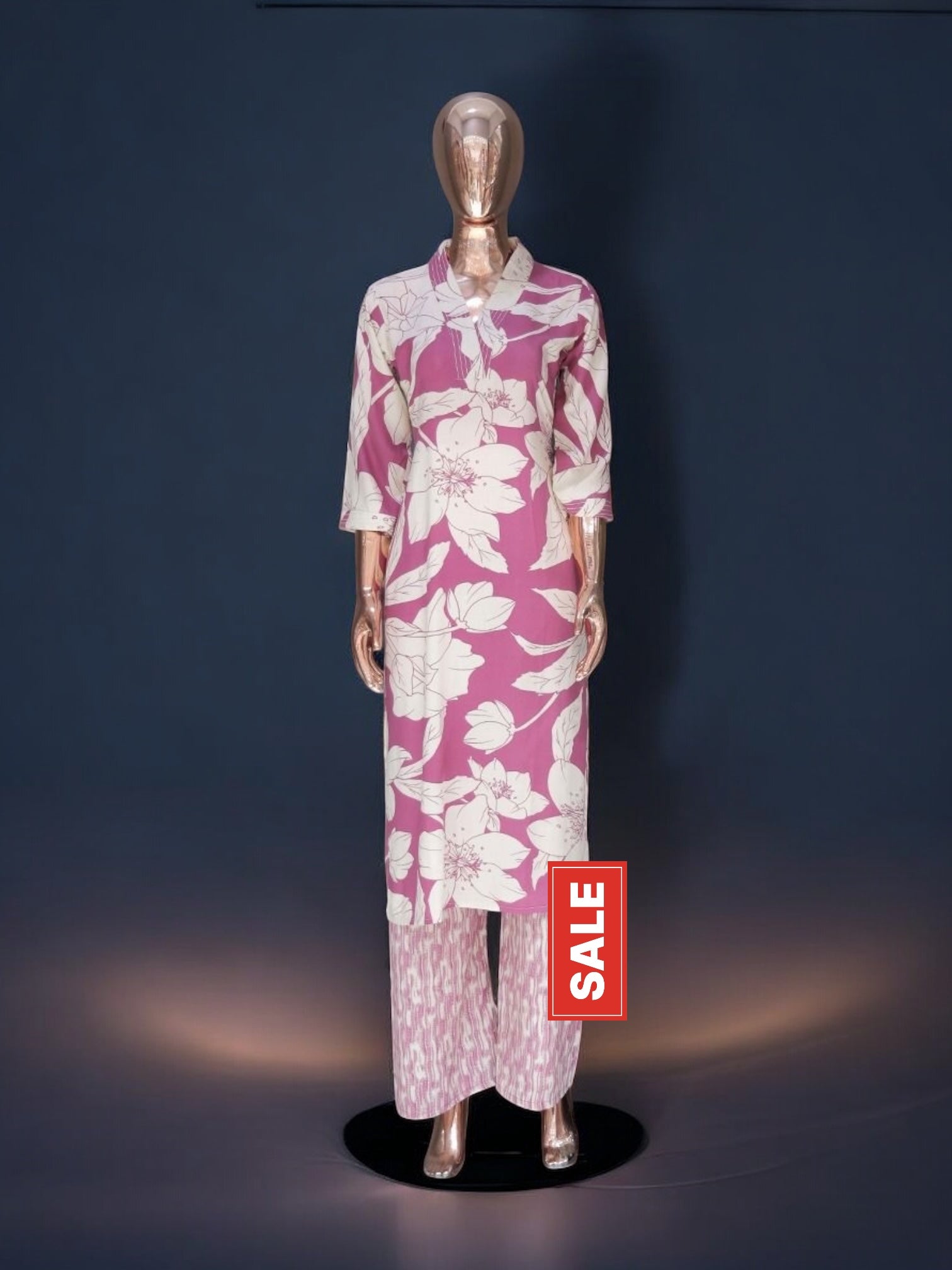 Traditional Salwar Kameez set for women by Saree Ghor Charlotte, featuring a vibrant Kurti with matching salwar and dupatta.