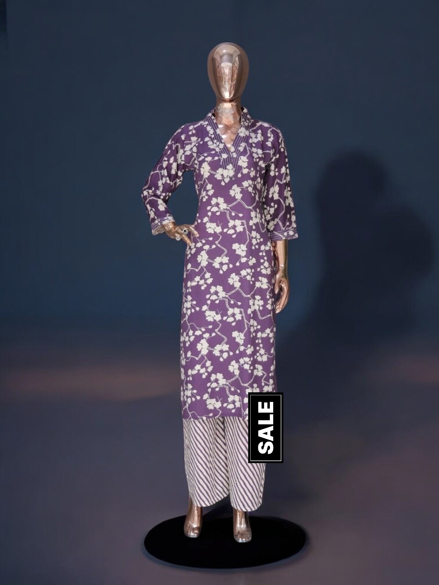 Traditional Kurti set by Saree Ghor Charlotte, ethnic salwar kameez for women with intricate embroidery and vibrant fabric.