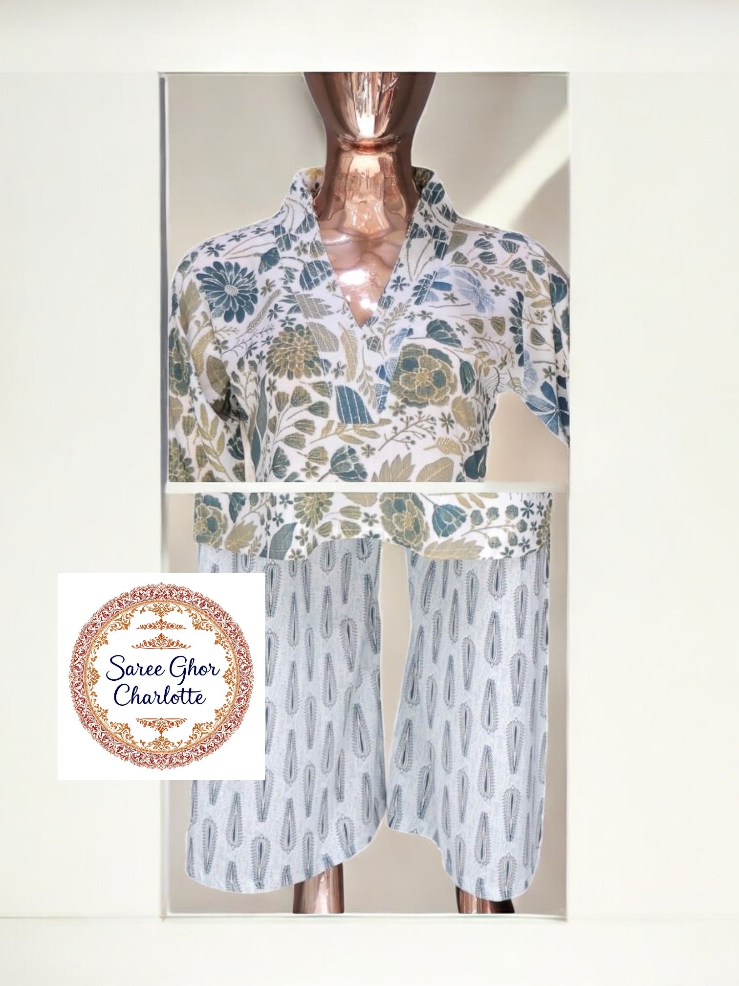Traditional Kurti set by Saree Ghor Charlotte featuring a colorful salwar kameez for women, ethnic wear with intricate design.