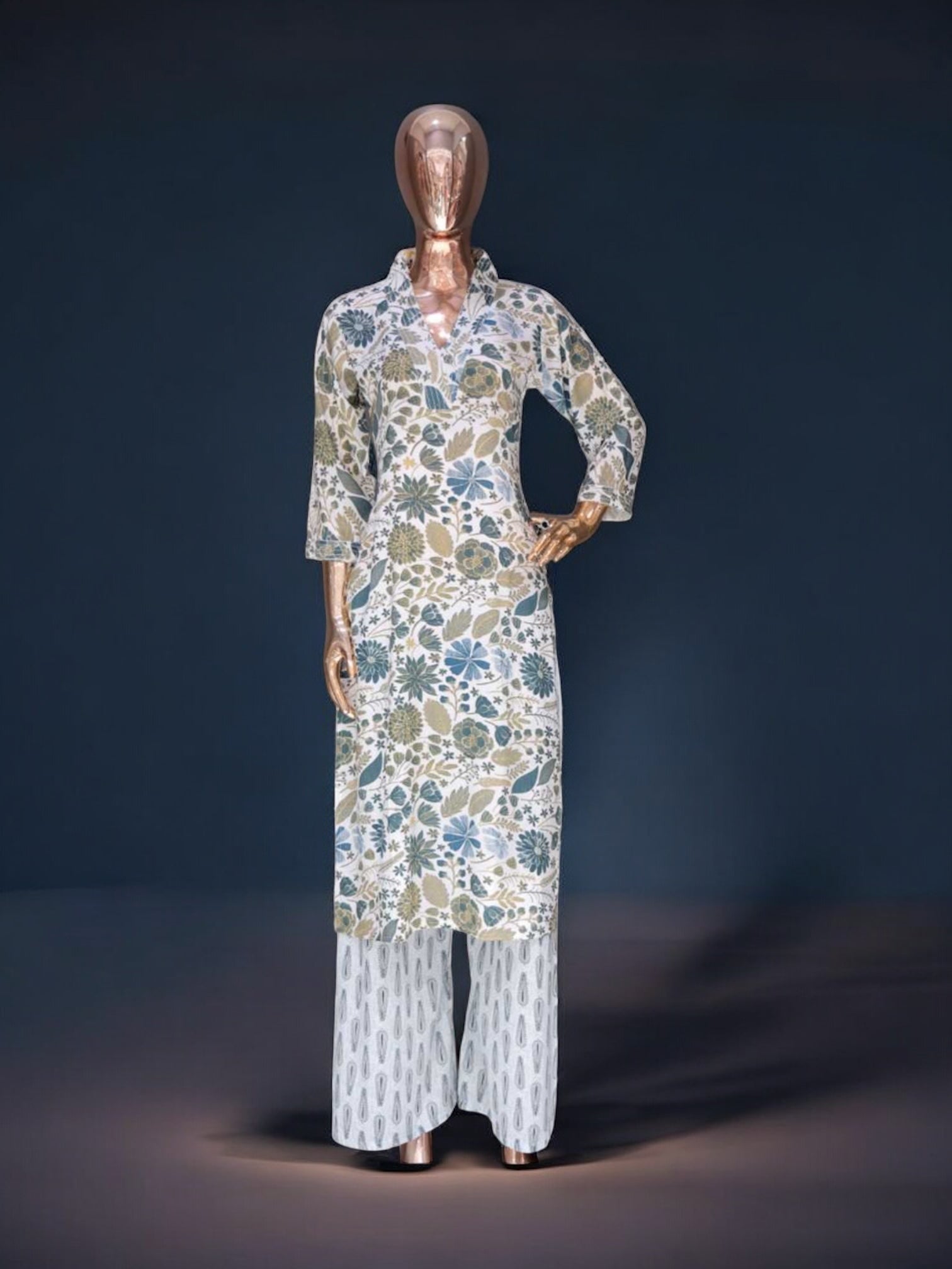 Traditional Kurti set by Saree Ghor Charlotte featuring a salwar kameez with intricate embroidery for women.