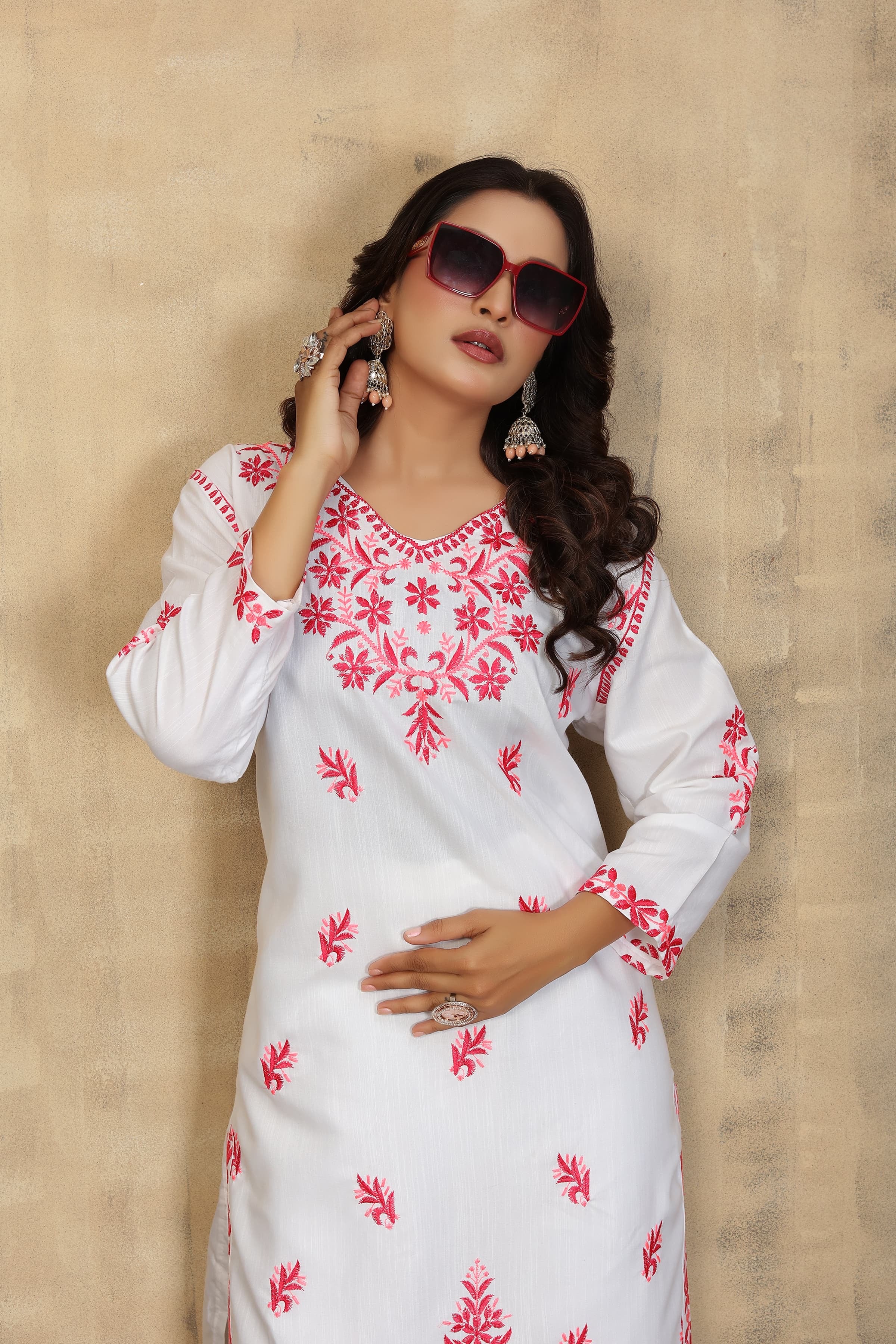 Traditional Kurti set with matching salwar for women by Saree Ghor Charlotte, showcasing vibrant ethnic wear and intricate design.