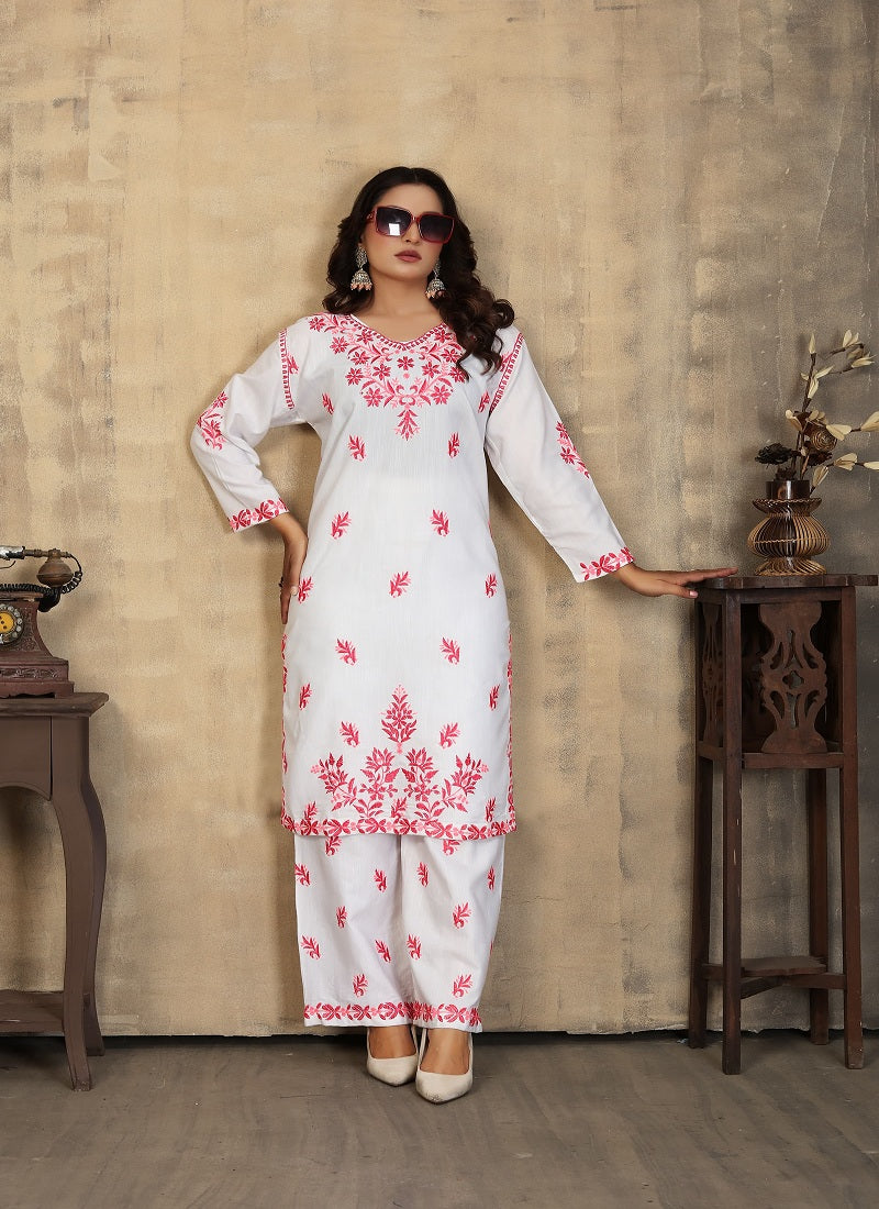 Traditional Kurti set by Saree Ghor Charlotte featuring ethnic salwar kameez with intricate designs for women.