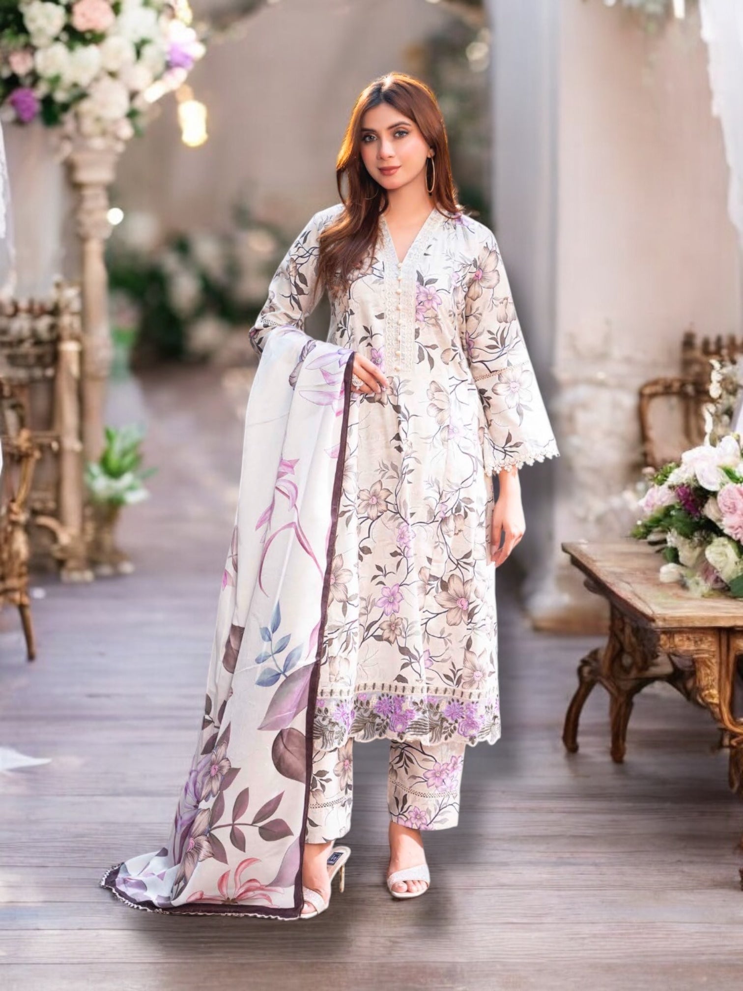 Traditional Pakistani Salwar Kameez by Saree Ghor Charlotte featuring vibrant ethnic wear, intricate embroidery, and elegant fabric details.