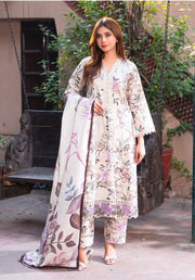 Traditional Pakistani Salwar Kameez by Saree Ghor Charlotte, ethnic women's wear with intricate embroidery and vibrant fabric.