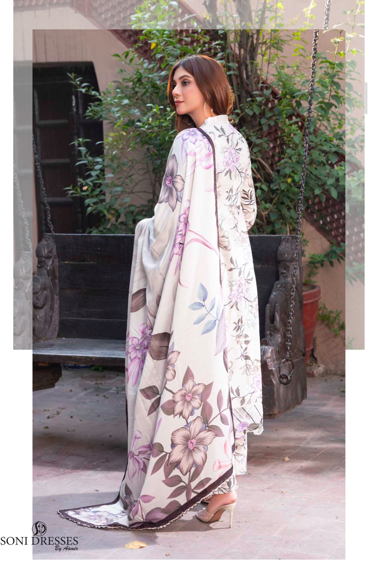 Traditional Pakistani Salwar Kameez by Saree Ghor Charlotte featuring intricate embroidery and vibrant ethnic wear for women.