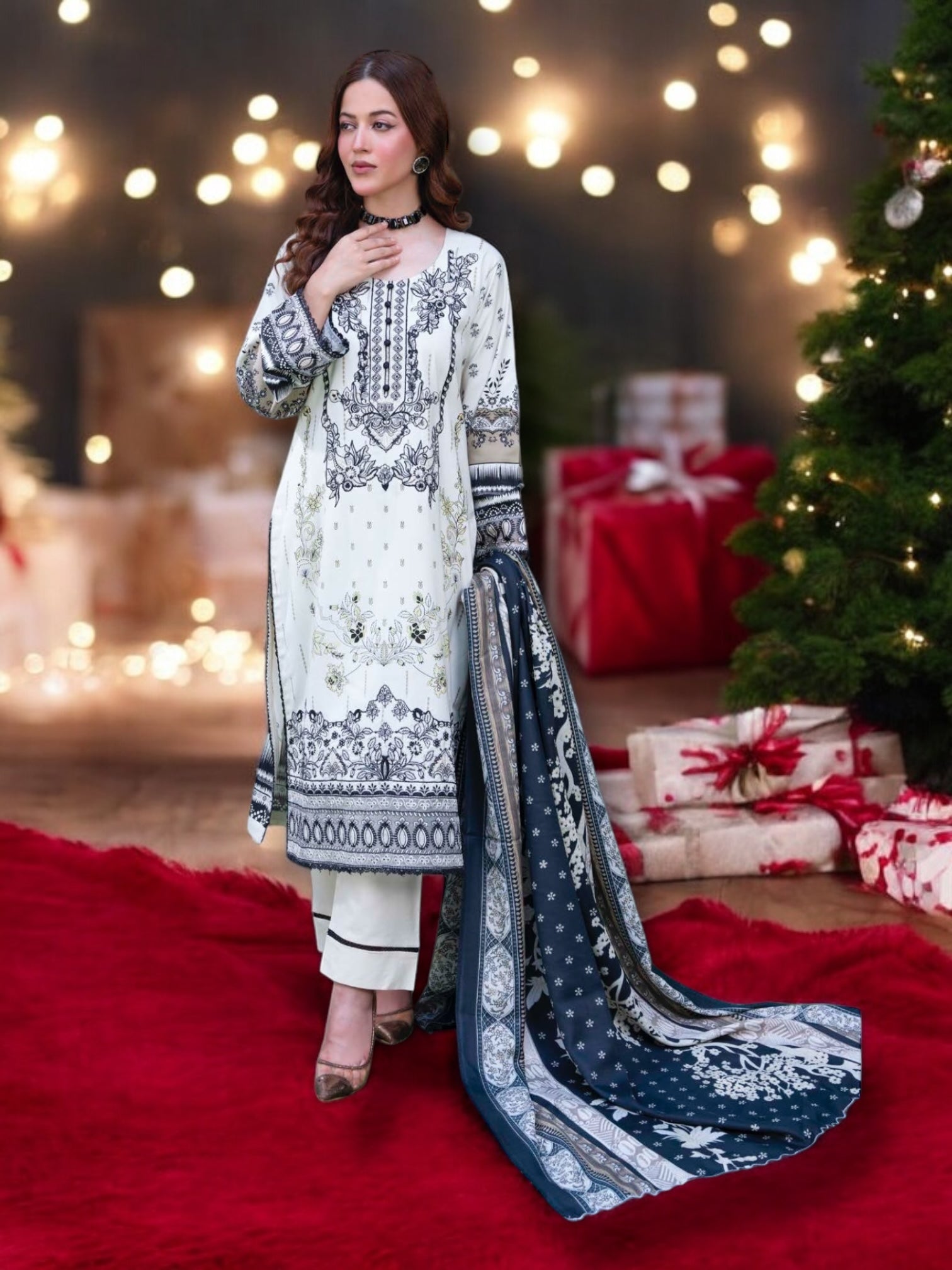 Traditional Pakistani Salwar Kameez by Saree Ghor Charlotte, showcasing vibrant ethnic wear for women with intricate embroidery.