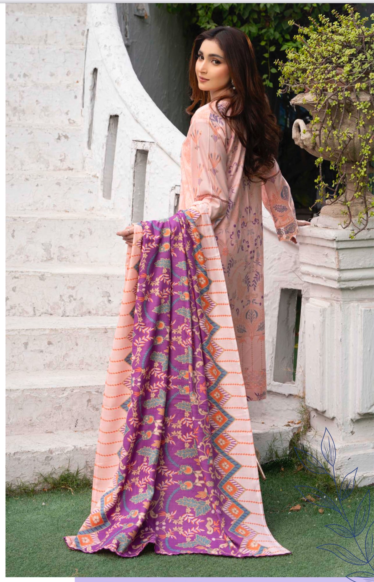 Traditional Pakistani Salwar Kameez by Saree Ghor Charlotte, ethnic women's wear with intricate embroidery and vibrant fabric.