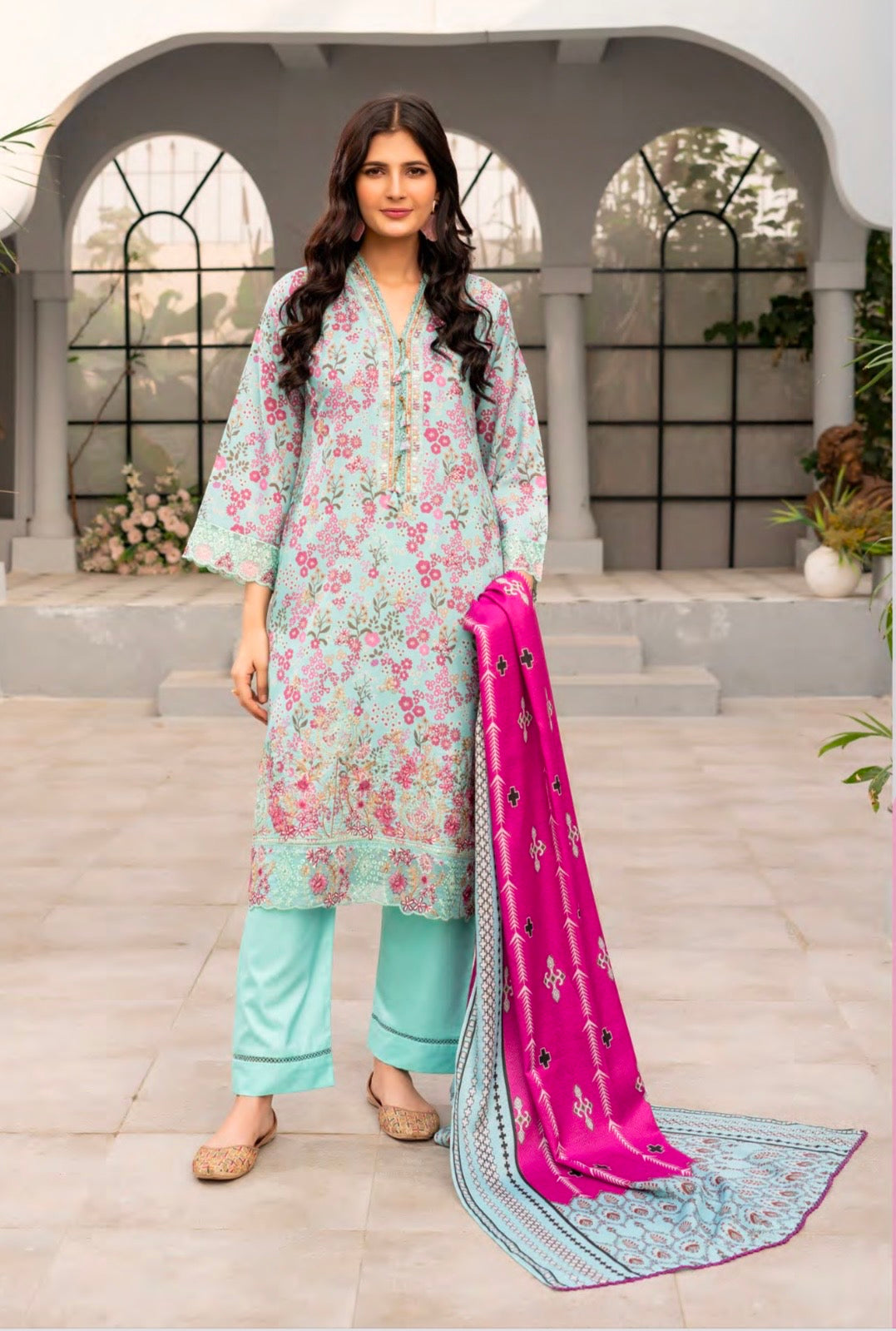 Traditional Pakistani Salwar Kameez by Saree Ghor Charlotte, ethnic women's cultural wear with intricate fabric and vibrant design.