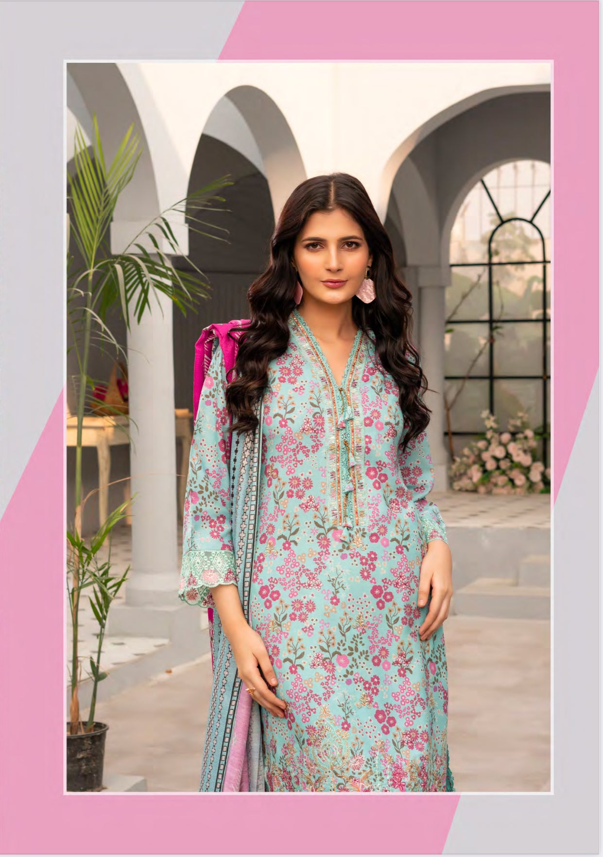Traditional Pakistani Salwar Kameez by Saree Ghor Charlotte, vibrant ethnic wear for women with intricate embroidery.