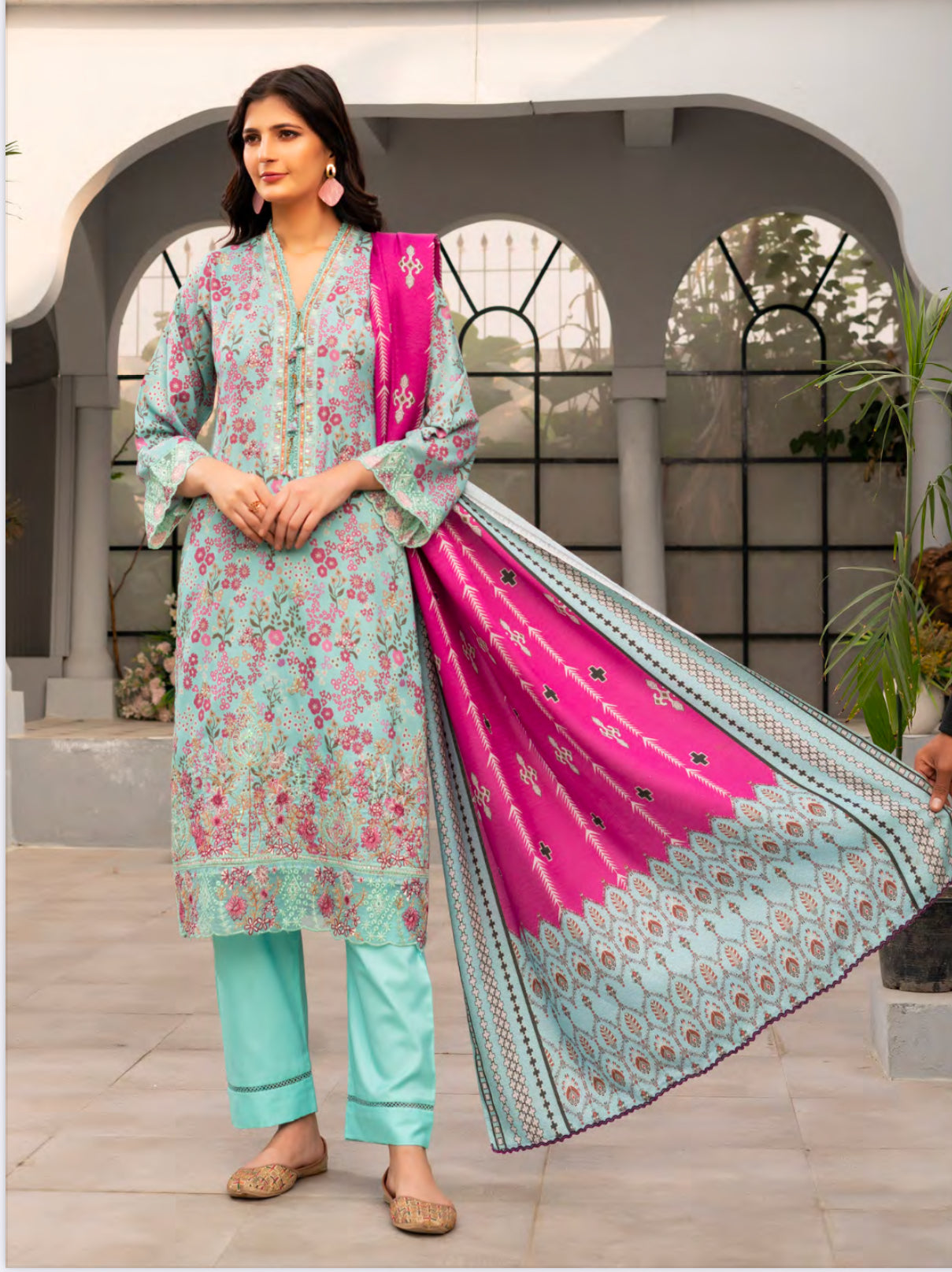 Traditional Pakistani Salwar Kameez from Saree Ghor Charlotte, ethnic wear for women with intricate embroidery and vibrant fabric.