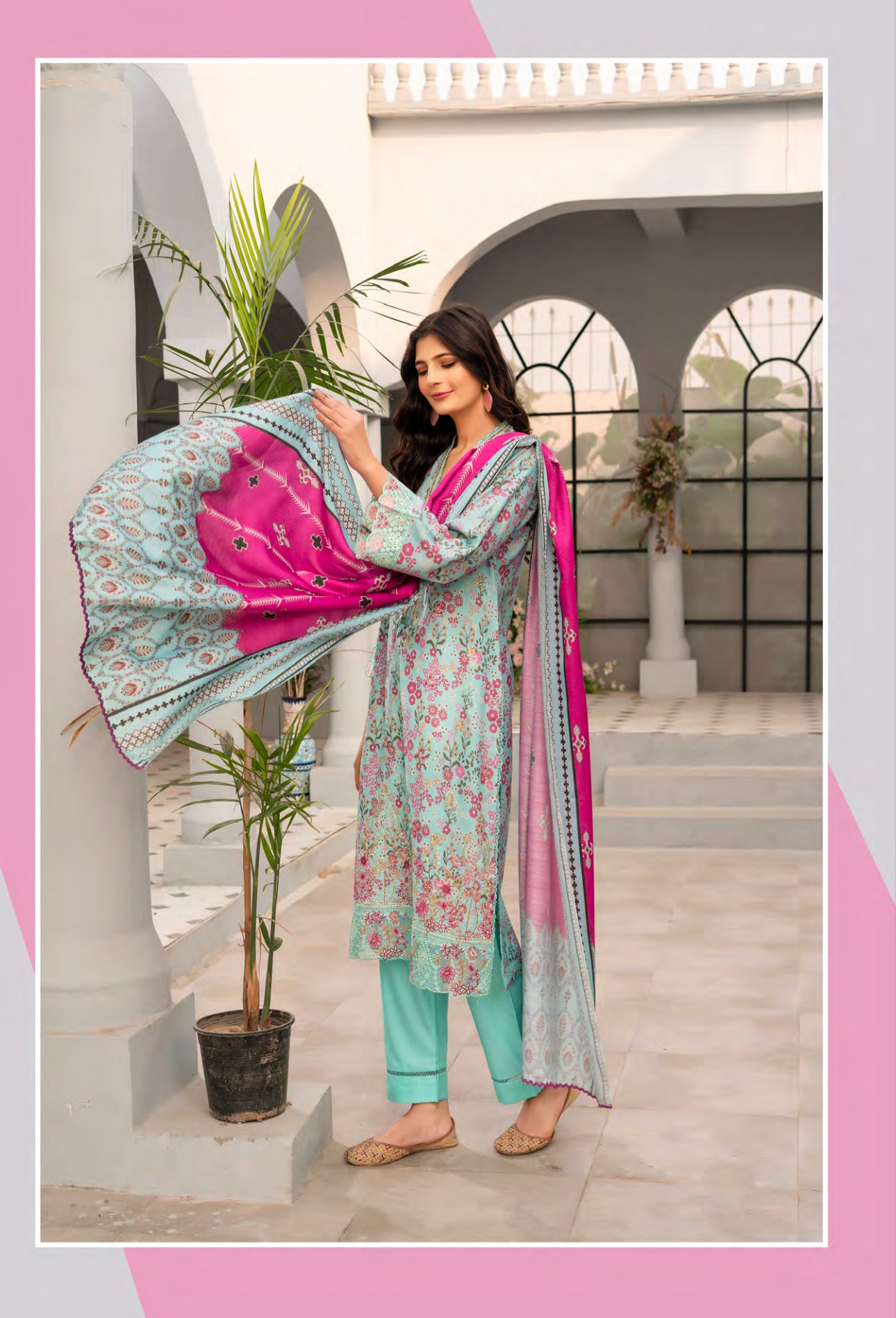 Traditional Pakistani Salwar Kameez by Saree Ghor Charlotte, vibrant ethnic wear with intricate details for women.