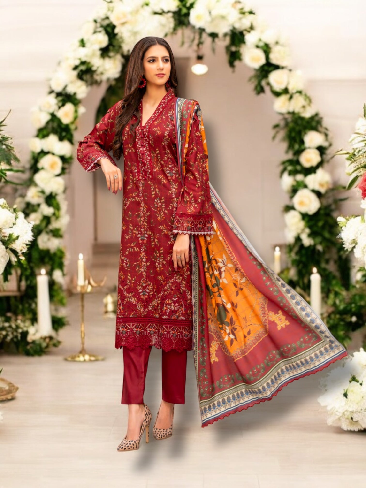 Traditional Pakistani Salwar Kameez by Saree Ghor Charlotte featuring vibrant ethnic wear for women with intricate embroidery.
