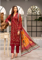 Traditional Pakistani Salwar Kameez by Saree Ghor Charlotte showing vibrant ethnic wear for women with intricate embroidery and colorful fabric.