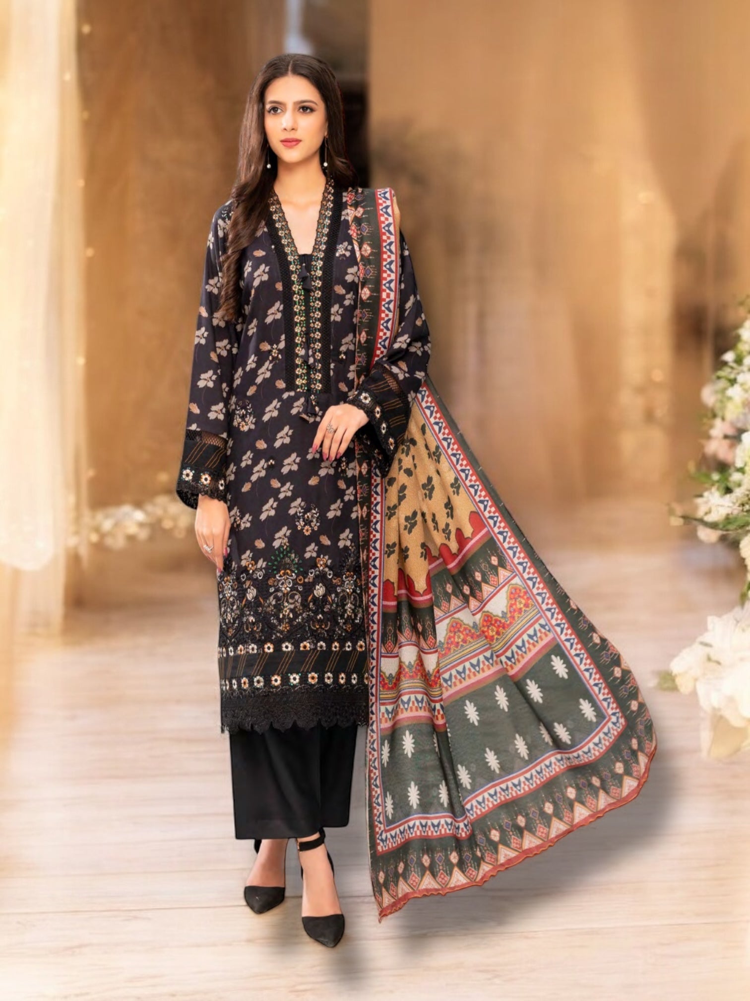 Traditional Pakistani Salwar Kameez by Saree Ghor Charlotte, ethnic women's cultural wear with intricate embroidery and vibrant fabric.