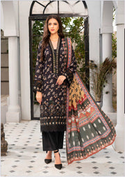 Traditional Pakistani Salwar Kameez by Saree Ghor Charlotte featuring intricate embroidery and vibrant fabric for women's ethnic wear.