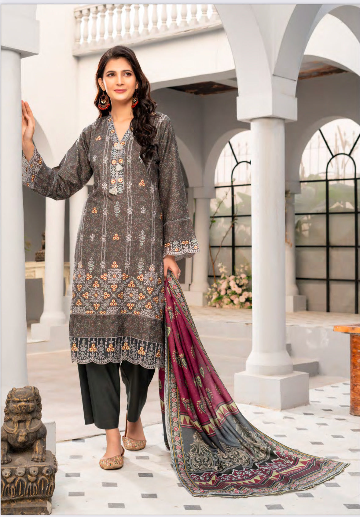 Traditional Pakistani Salwar Kameez by Saree Ghor Charlotte, featuring vibrant ethnic wear for women with intricate patterns and elegant fabric.