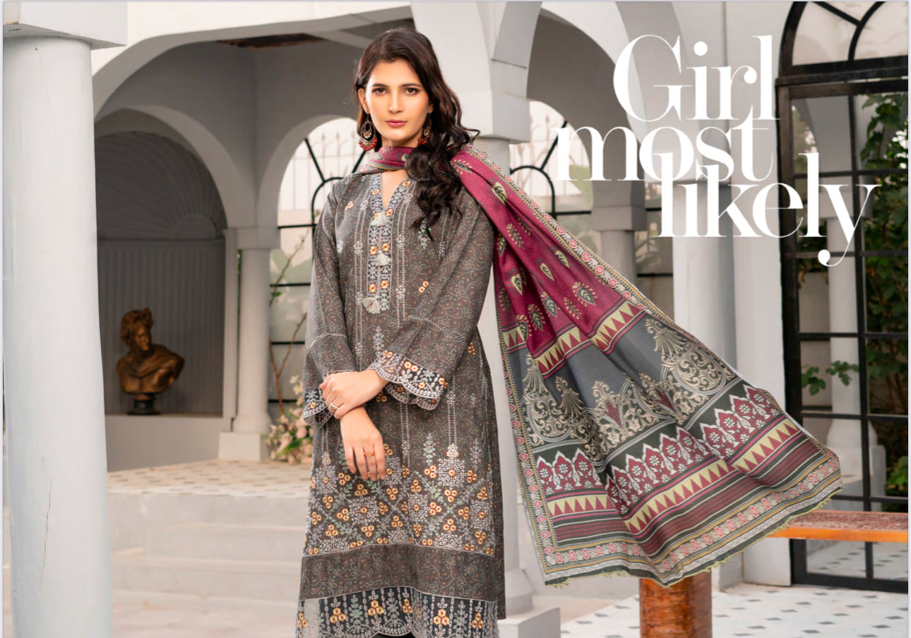 Traditional Pakistani Salwar Kameez by Saree Ghor Charlotte, ethnic women's dress with intricate embroidery and vibrant fabric.