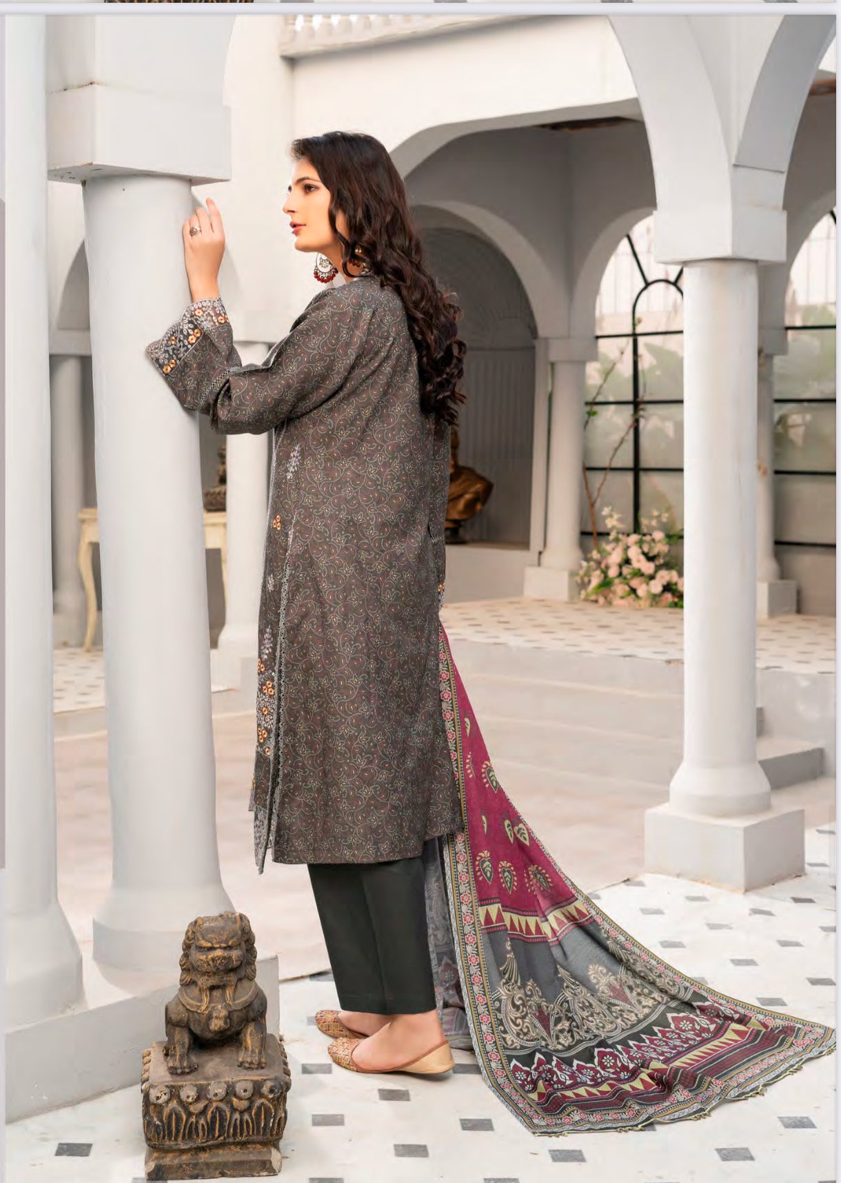 Traditional Pakistani Salwar Kameez for women by Saree Ghor Charlotte, featuring intricate ethnic design and vibrant fabric.