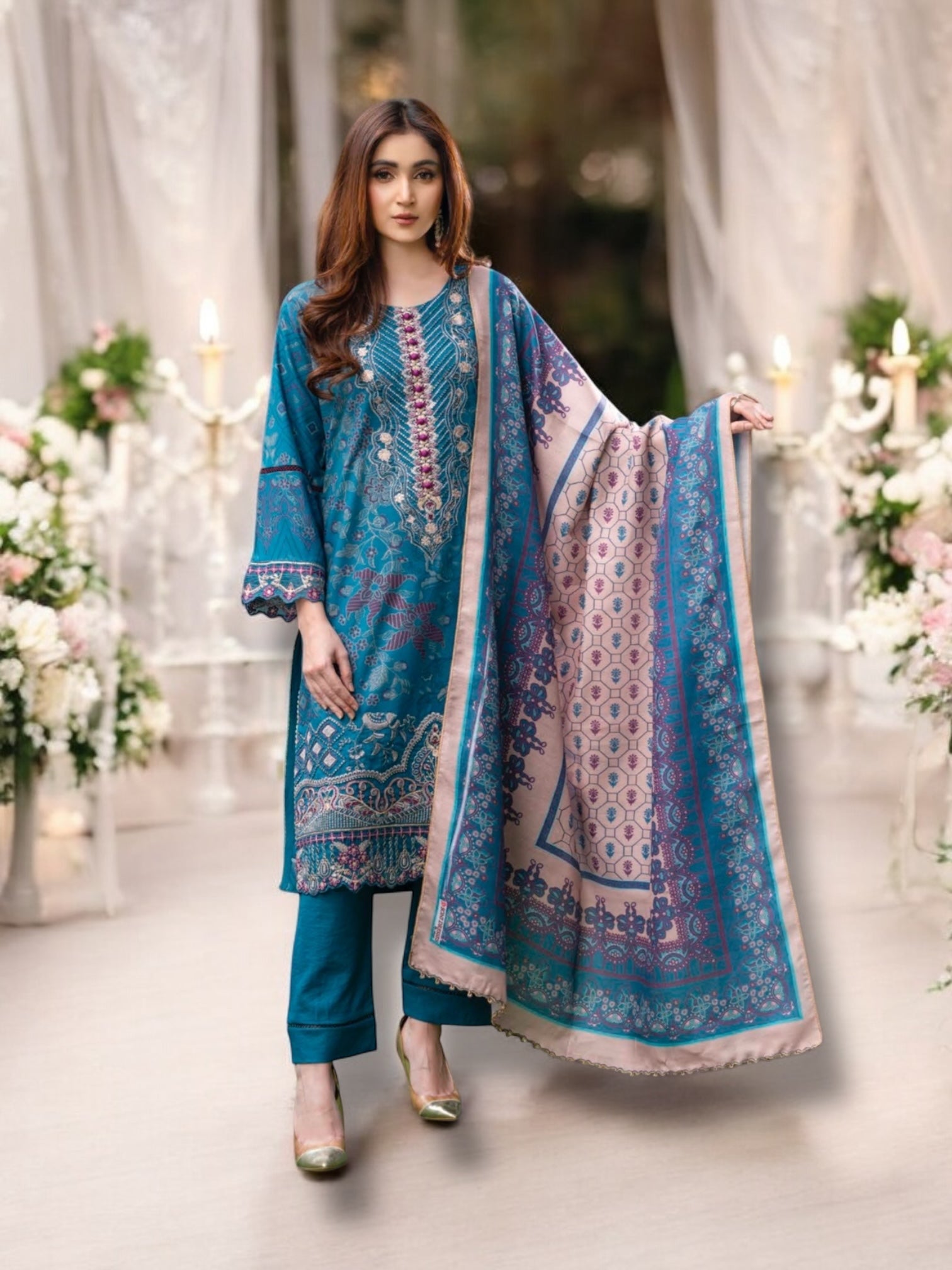 Traditional Pakistani Salwar Kameez by Saree Ghor Charlotte, featuring vibrant ethnic wear for women with intricate patterns.