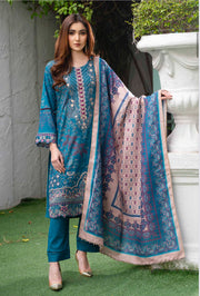 Traditional Pakistani Salwar Kameez by Saree Ghor Charlotte, featuring vibrant ethnic wear for women with intricate patterns.
