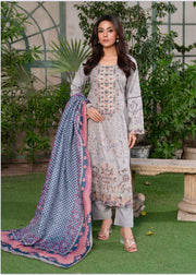 Traditional Pakistani Salwar Kameez by Saree Ghor Charlotte, featuring vibrant ethnic wear for women with intricate patterns and colorful fabric.