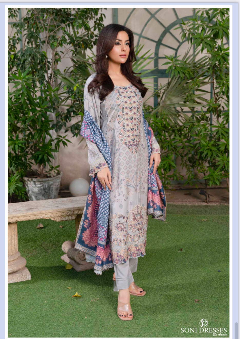 Traditional Pakistani Salwar Kameez by Saree Ghor Charlotte featuring intricate embroidery and vibrant colors for women’s ethnic wear.