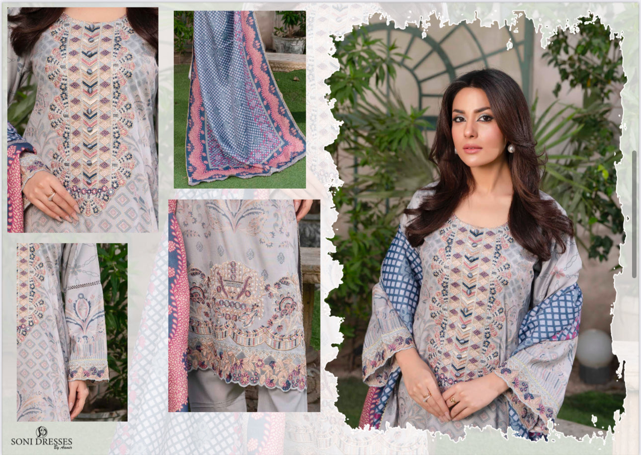 Traditional Pakistani Salwar Kameez by Saree Ghor Charlotte, vibrant ethnic wear for women featuring intricate embroidery and bright colors.