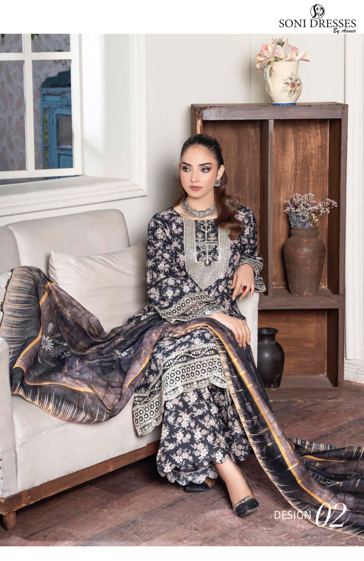 Traditional Pakistani Salwar Kameez by Saree Ghor Charlotte featuring intricate embroidery and vibrant ethnic wear for women.
