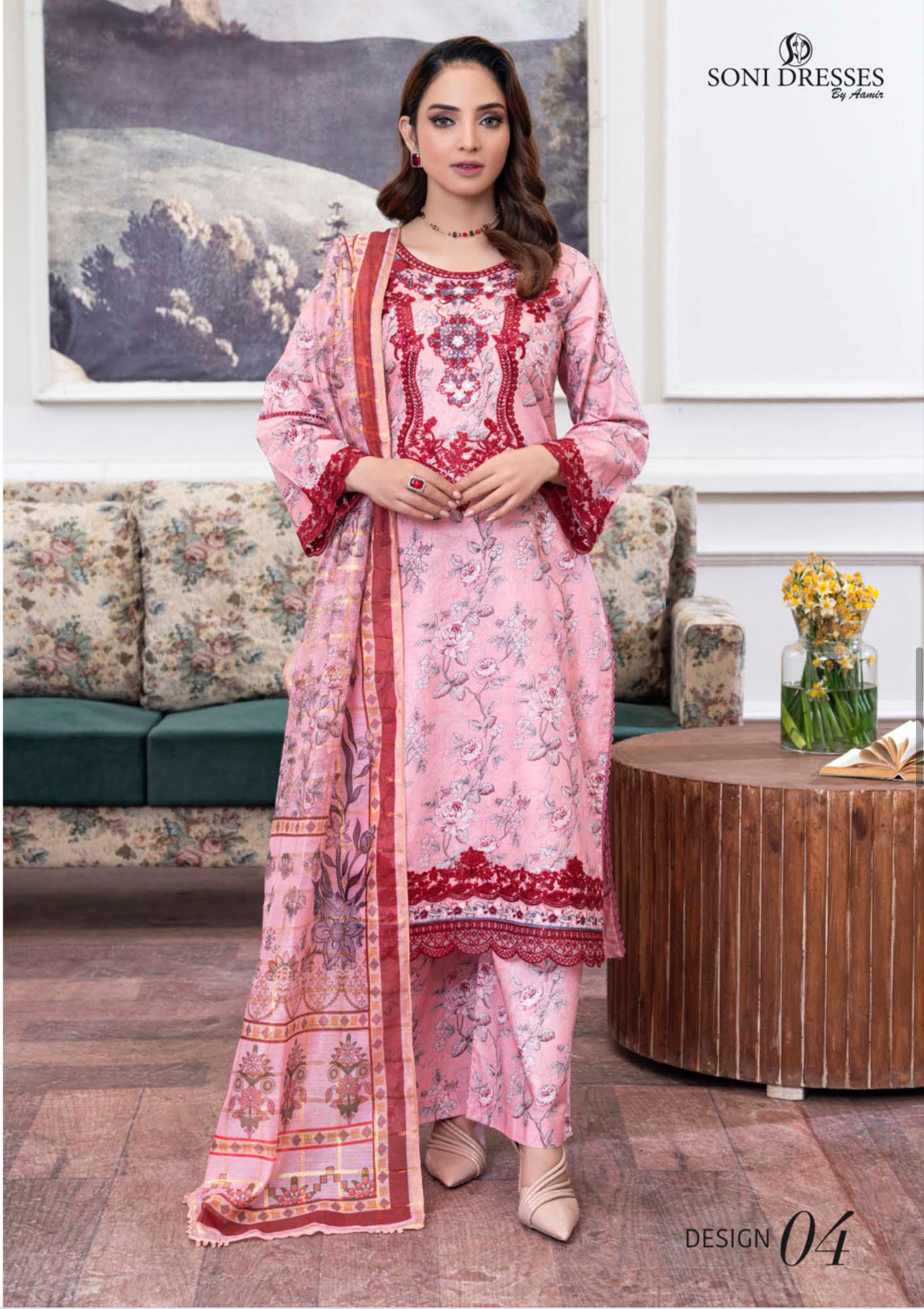 Traditional Pakistani Salwar Kameez by Saree Ghor Charlotte, featuring intricate embroidery and vibrant ethnic wear for women.
