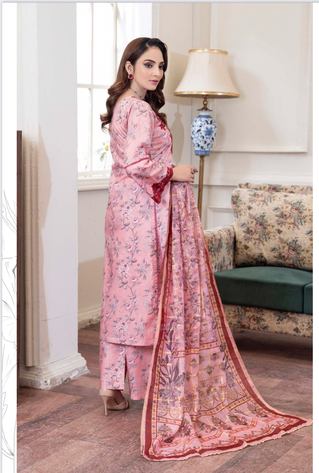 Traditional Pakistani Salwar Kameez by Saree Ghor Charlotte, featuring vibrant ethnic wear for women with intricate details and colorful fabric.