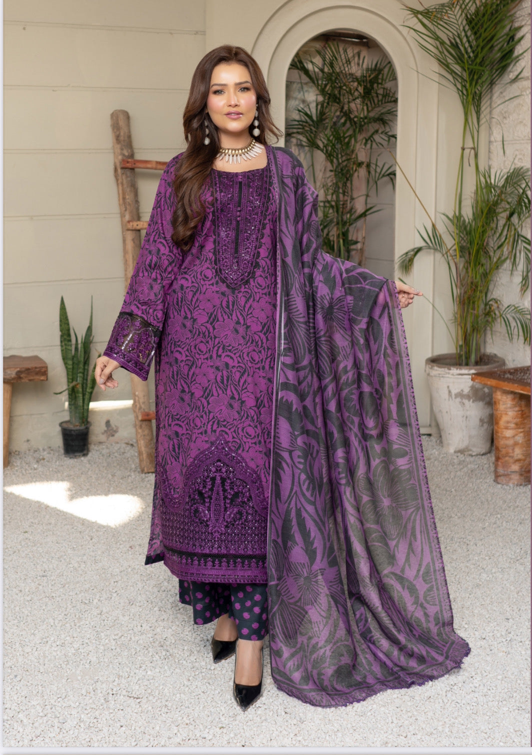 Traditional Pakistani Salwar Kameez by Saree Ghor Charlotte, ethnic wear for women featuring intricate embroidery and vibrant colors.